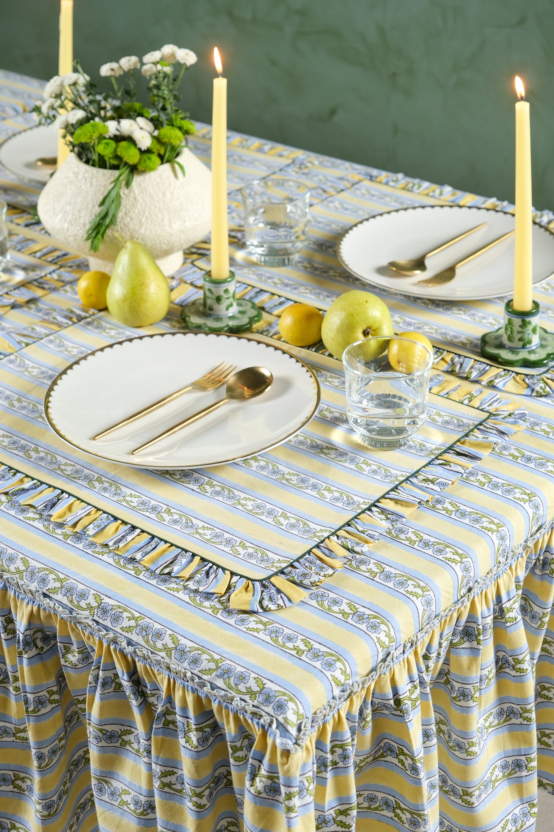 Inner Child Provence ruffled butter yellow blockprint tablecloth full dining setup with candles