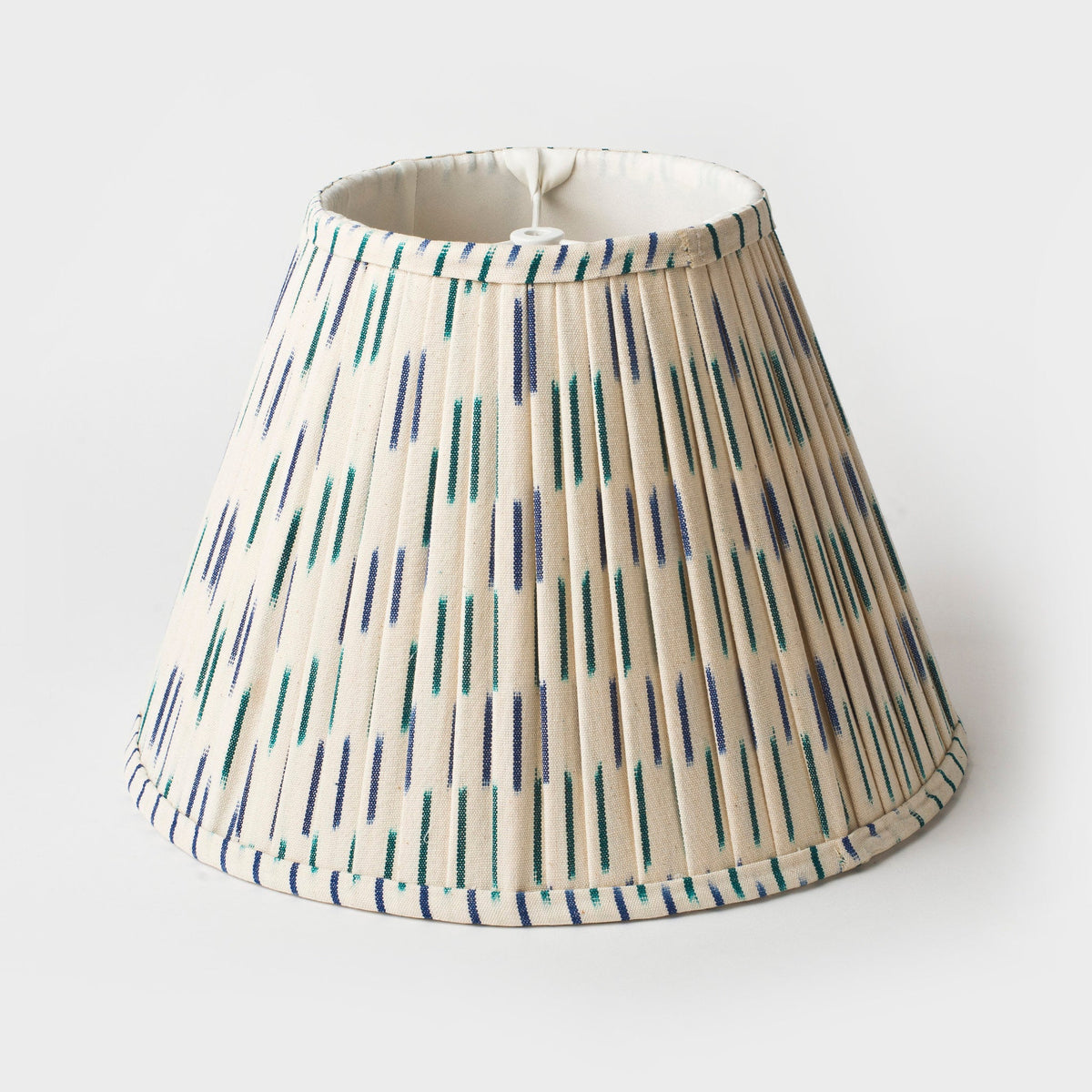 Lampshade styled on table lamp in living space
