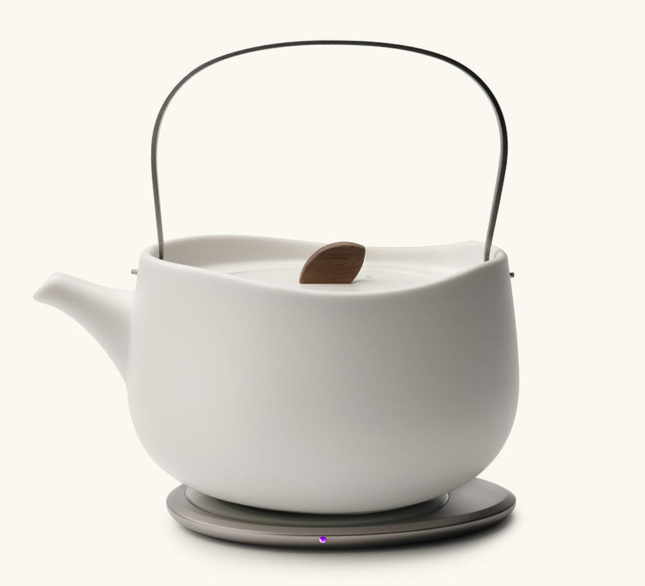 Leiph Self-Heating Ceramic Teapot Set 20 fl oz / 600 mL in Jasmine White on Ohom Charging Pad 3