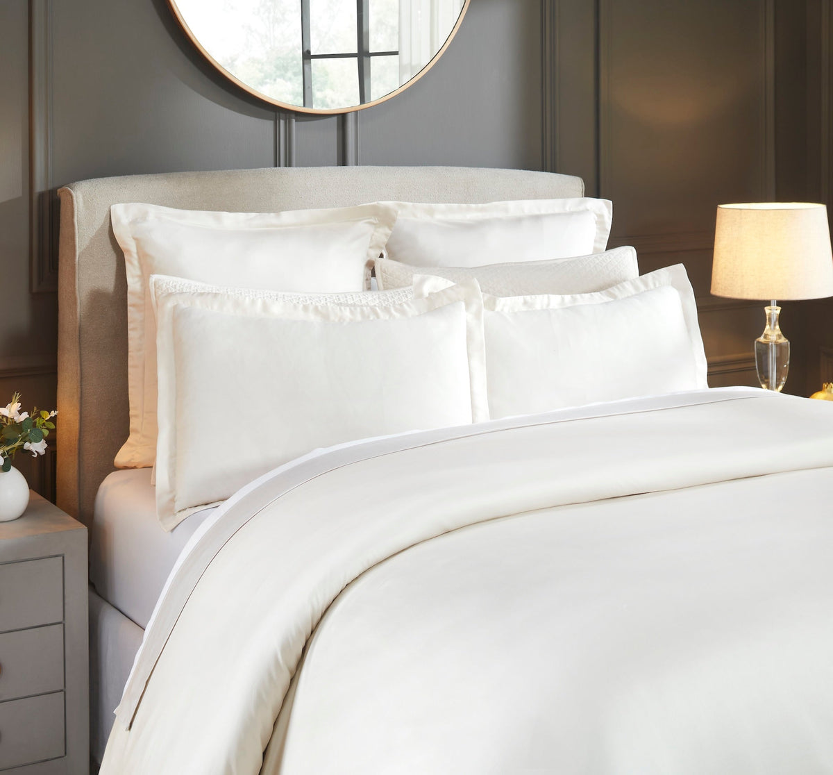 DT-046-9092_3|Close-up of an elegant cream luxurious soft cotton duvet cover, adding sophisticated comfort to a timeless bedroom.