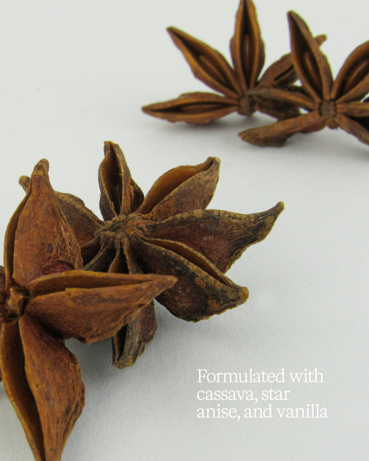 Star anise spices on a white background with text about ingredients.