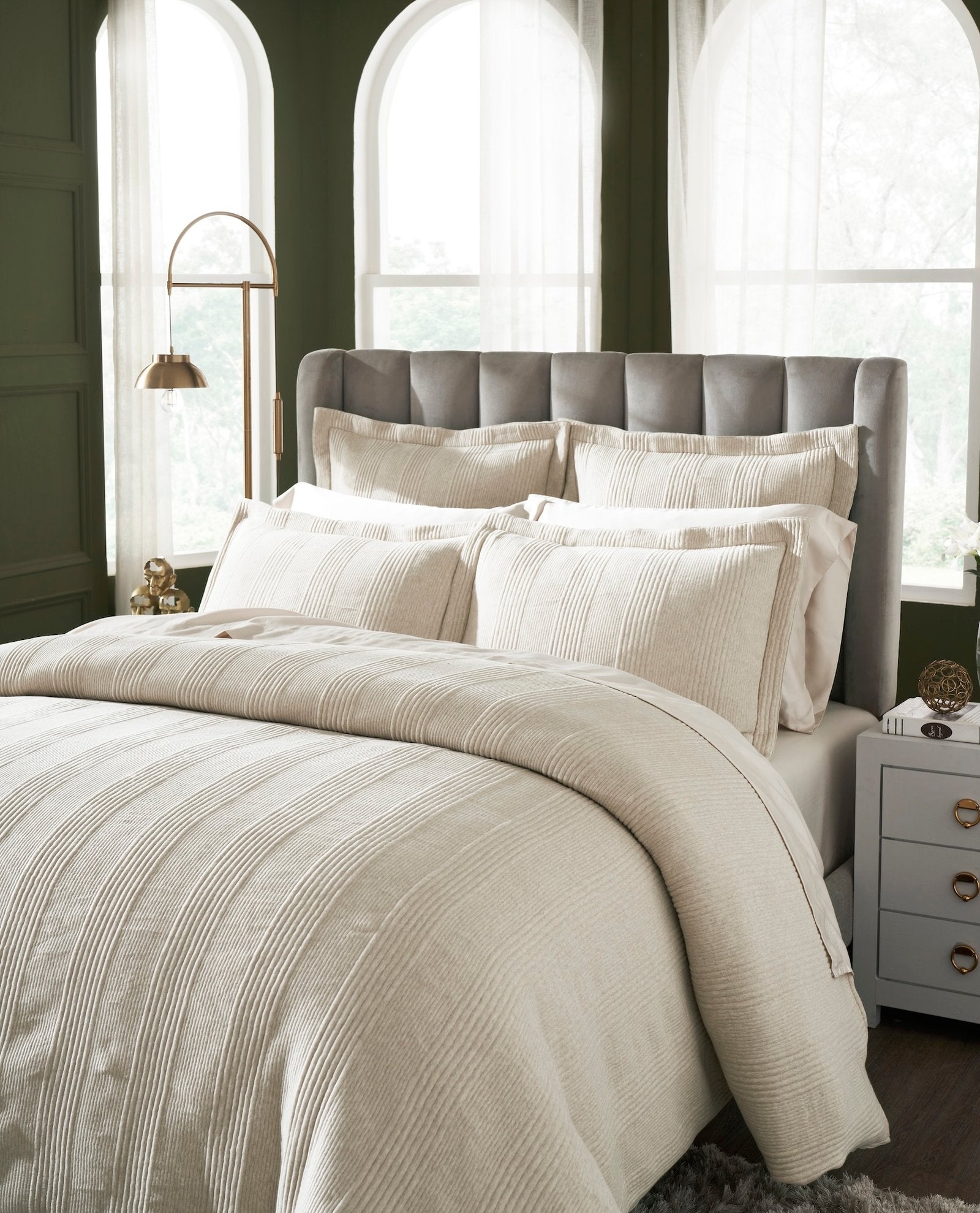 DT-040-10692_3|Detailed view of a beige textured duvet cover and pillows with subtle vertical stripes, adding warmth and sophistication.