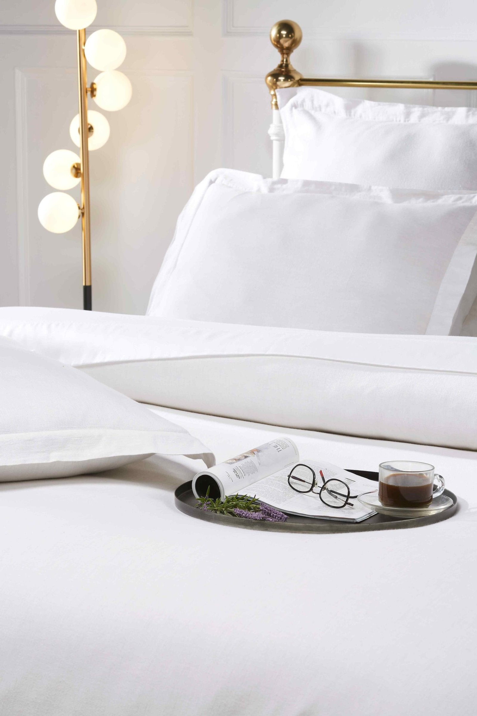 DT-023-10692_4|Close-up of a smooth white cotton duvet cover, highlighting its clean lines and inviting, breathable texture.