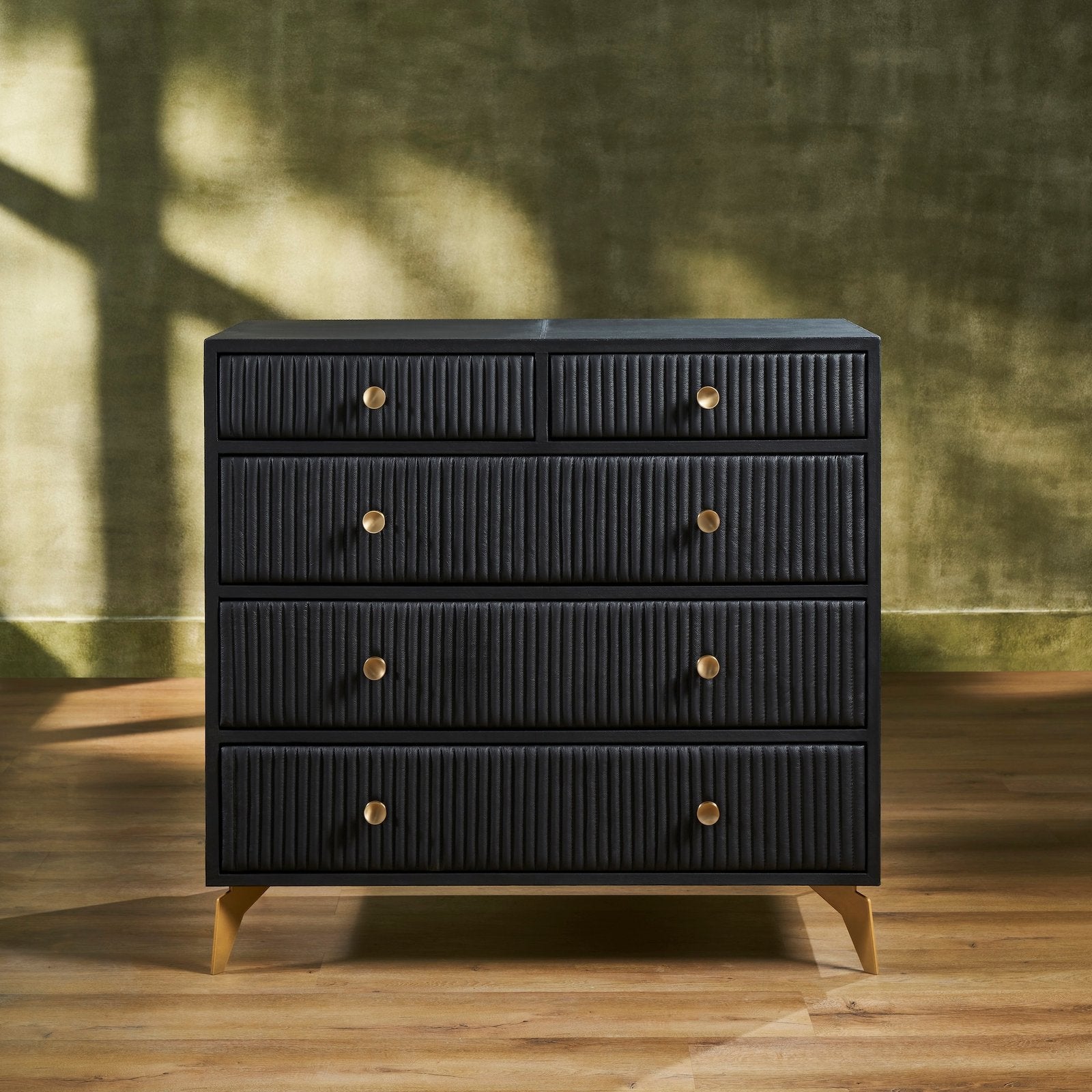 FN-5216-X_1|Elegant black fluted dresser with striking gold hardware, a sophisticated chest of drawers adding style to any room.