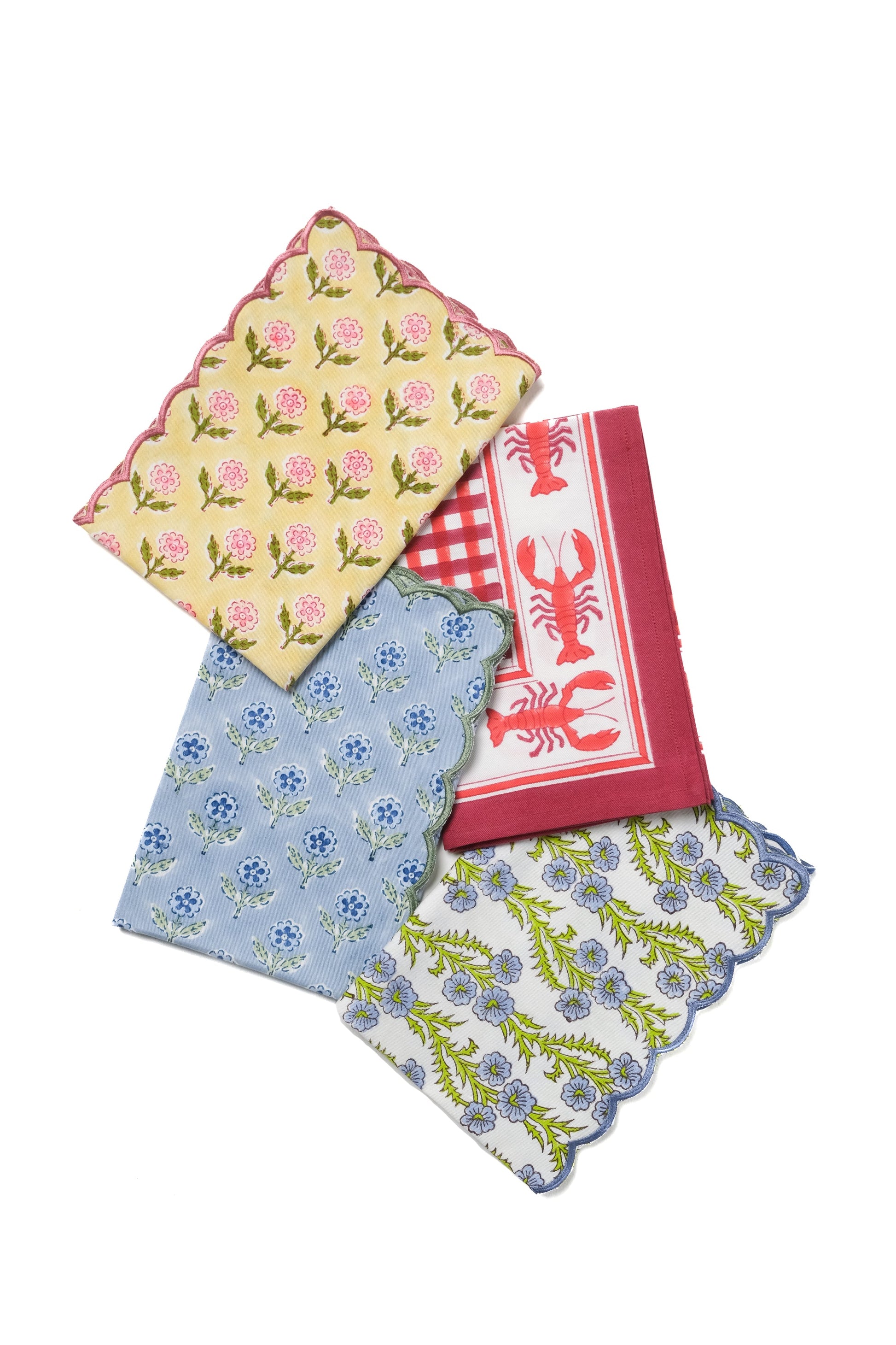 Assorted decorative cocktail napkins including lobster and floral designs from Inner Child