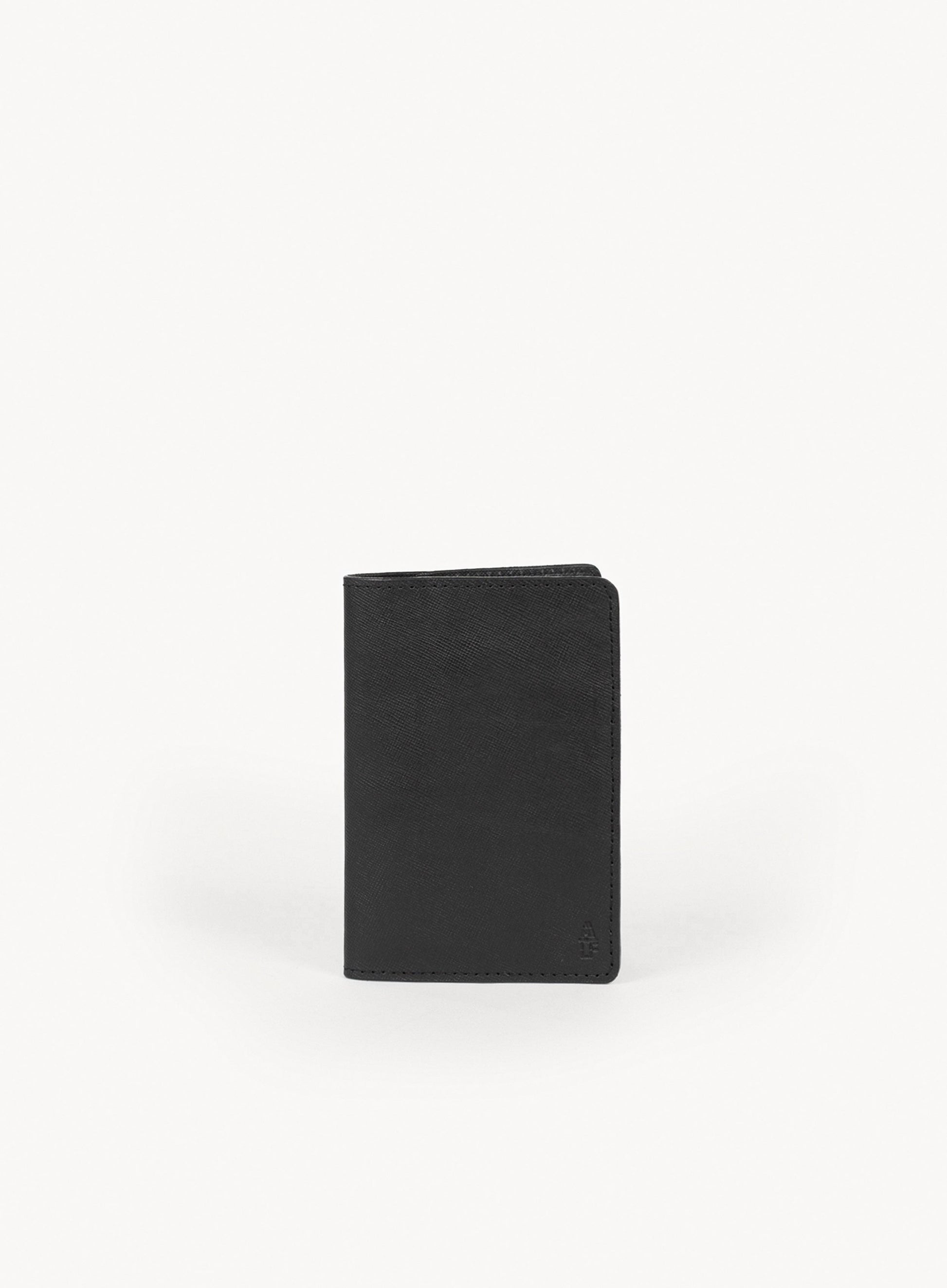operators passport cover in black front-view.
