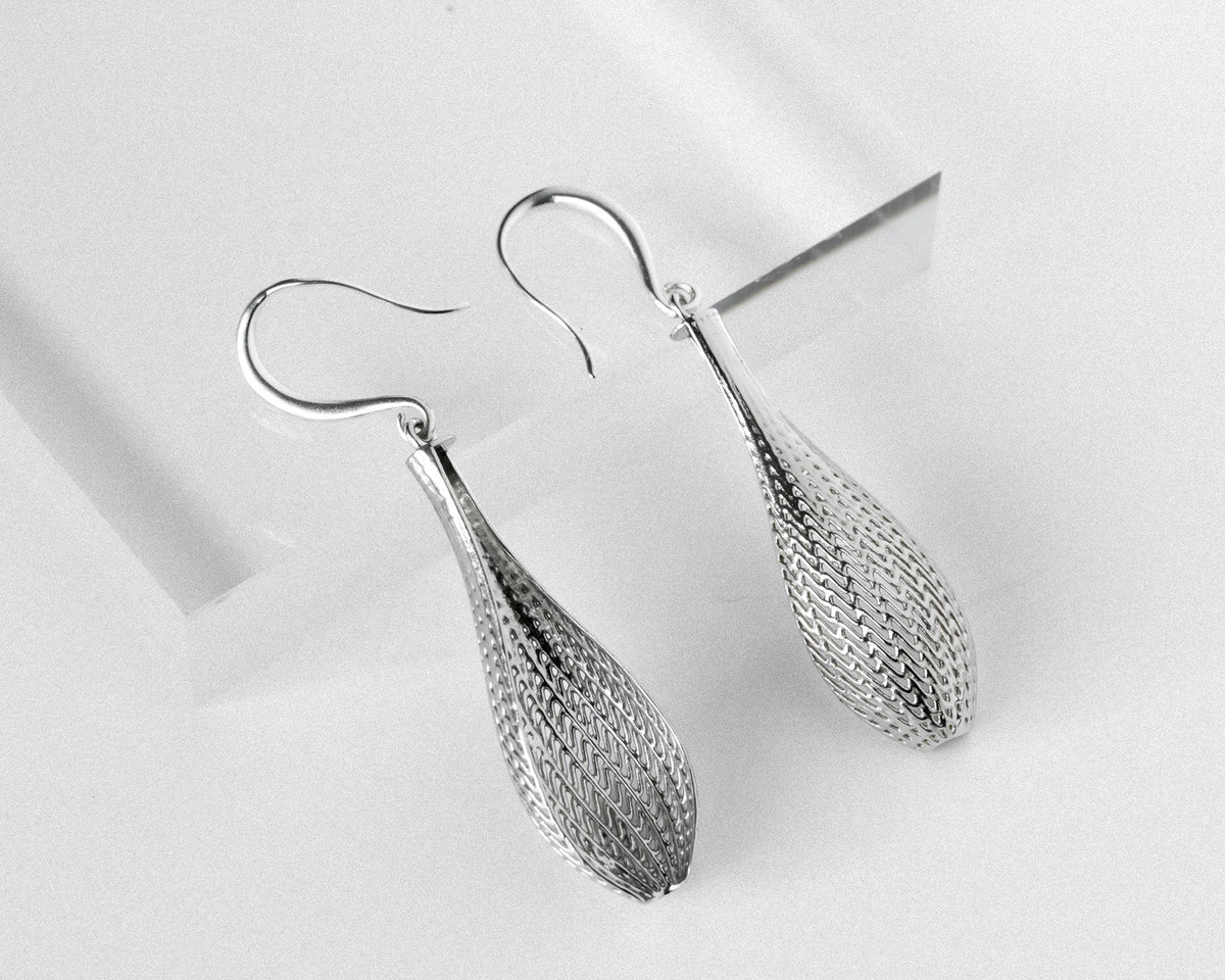 flow small tapered drop earrings with flowing lattice surface, silver-tone.