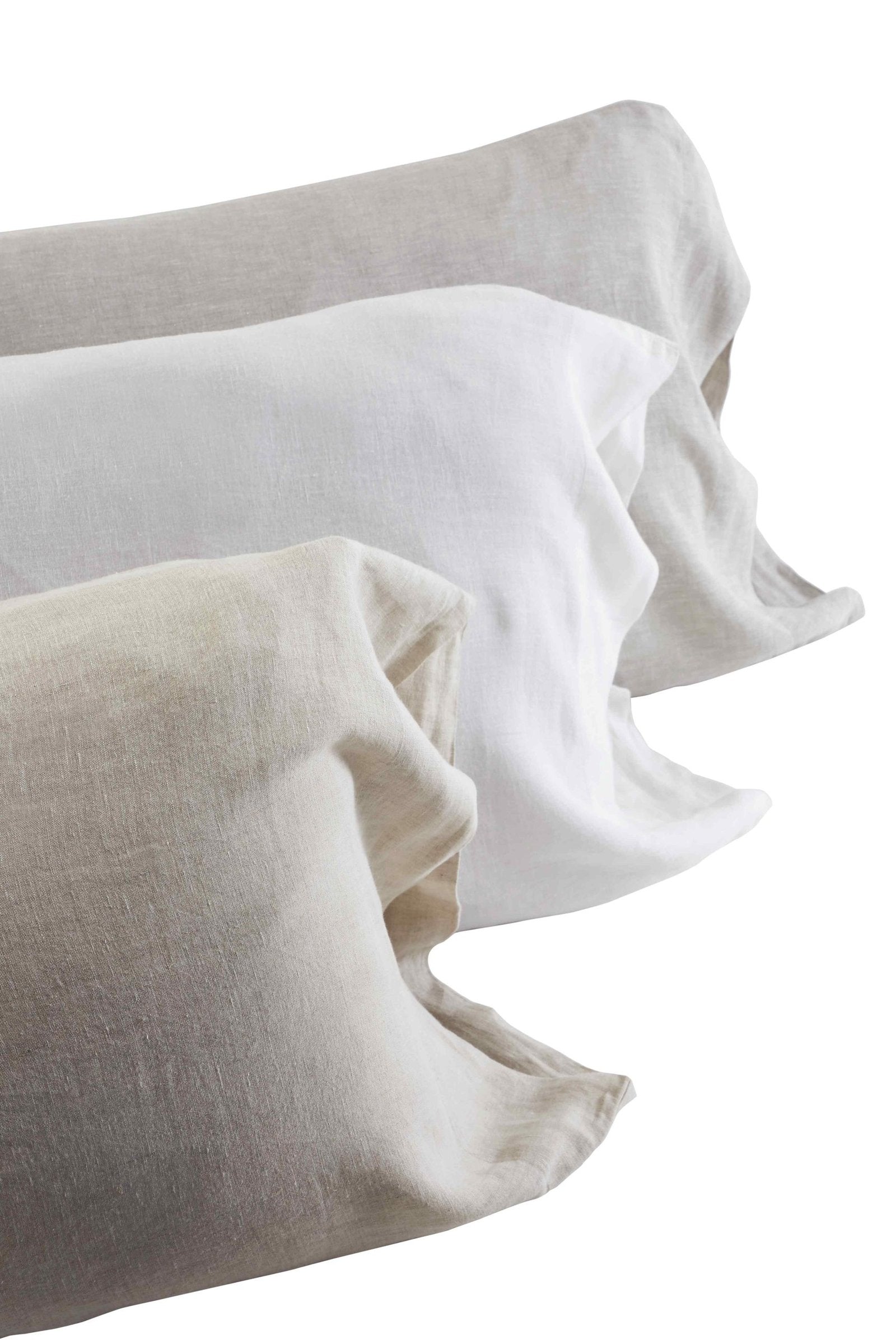 AKP-516-2040_3|Assortment of 100% Linen sheets in natural, white, and light grey shades. Soft, breathable, textured bedding options.