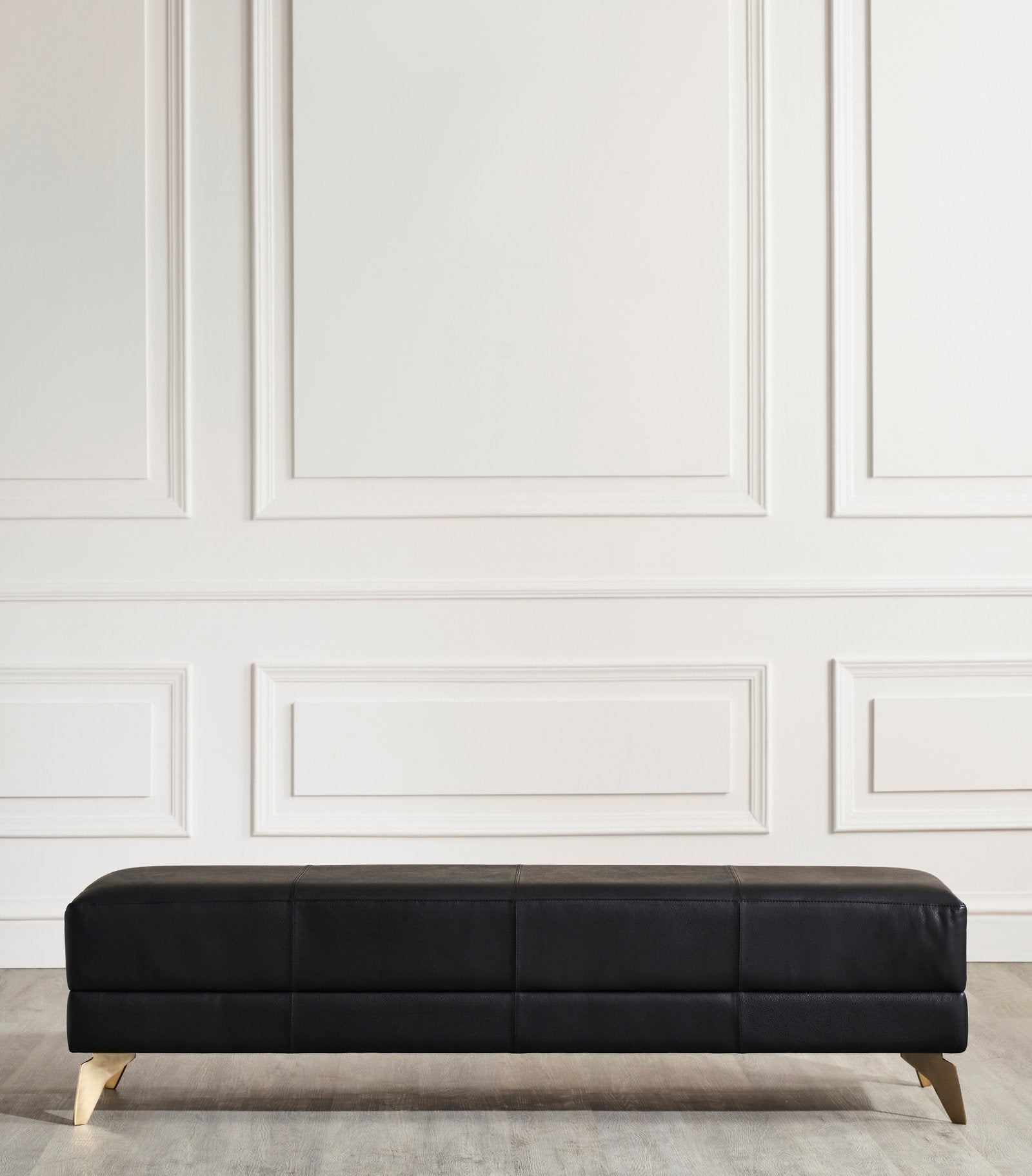 FN-5200-601618_2|Modern black leather upholstered bench with sleek lines and golden tapered legs, enhancing any contemporary living space.