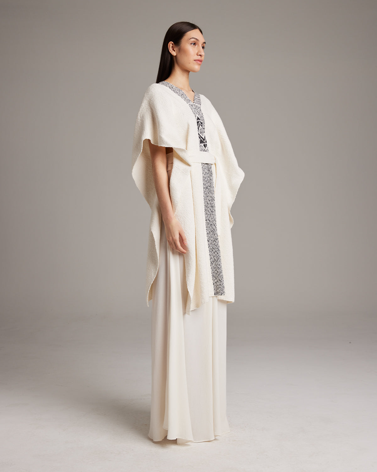 Model wearing Estrella Kaftan in Textured Cotton, showcasing design and fit