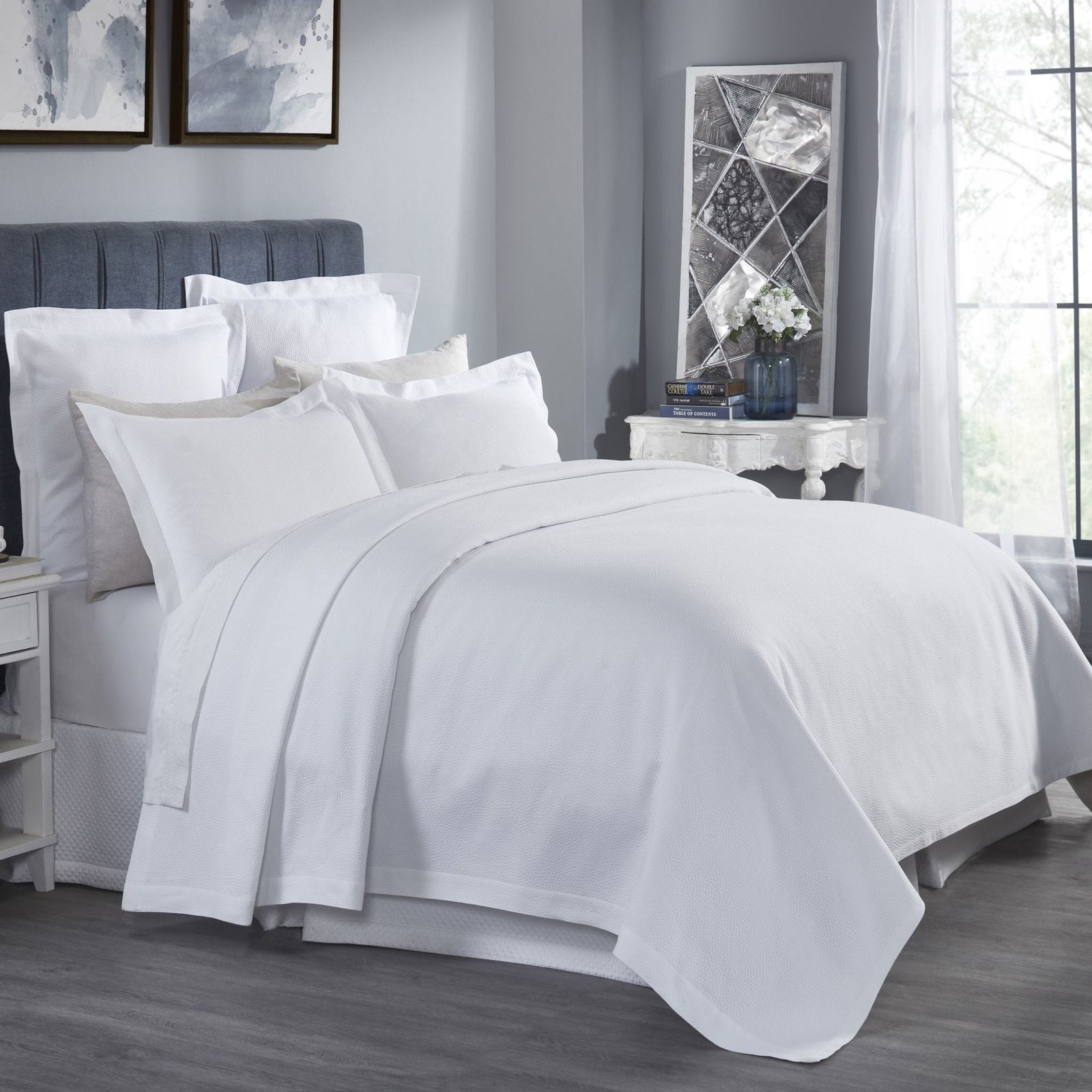 CL-258-9496_2|Crisp white coverlet featuring a delicate, subtle dimpled texture for a modern and clean bedroom design.