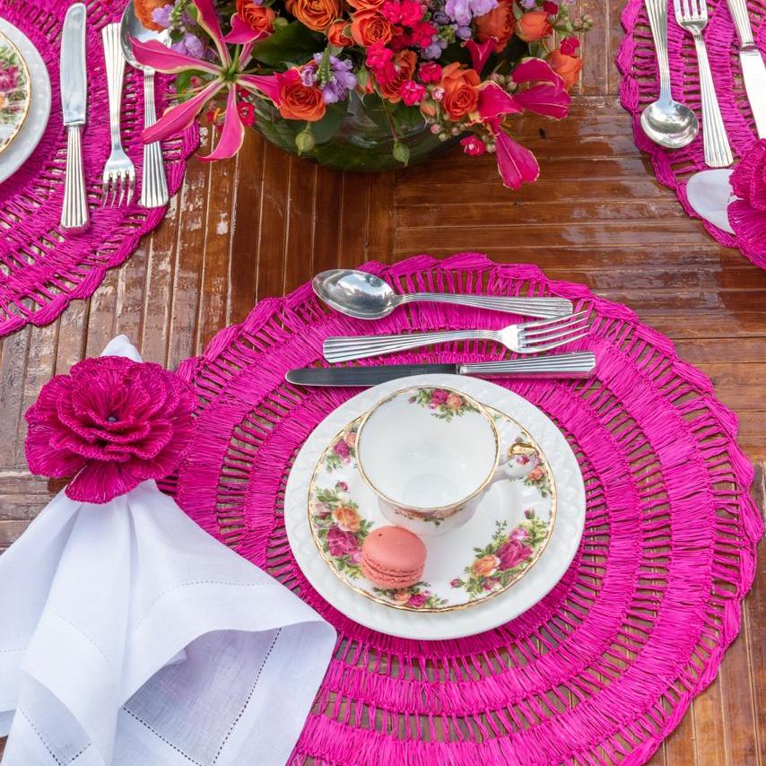 Buriti straw placemat handwoven from natural Brazilian palm fiber in pink by Talah Home