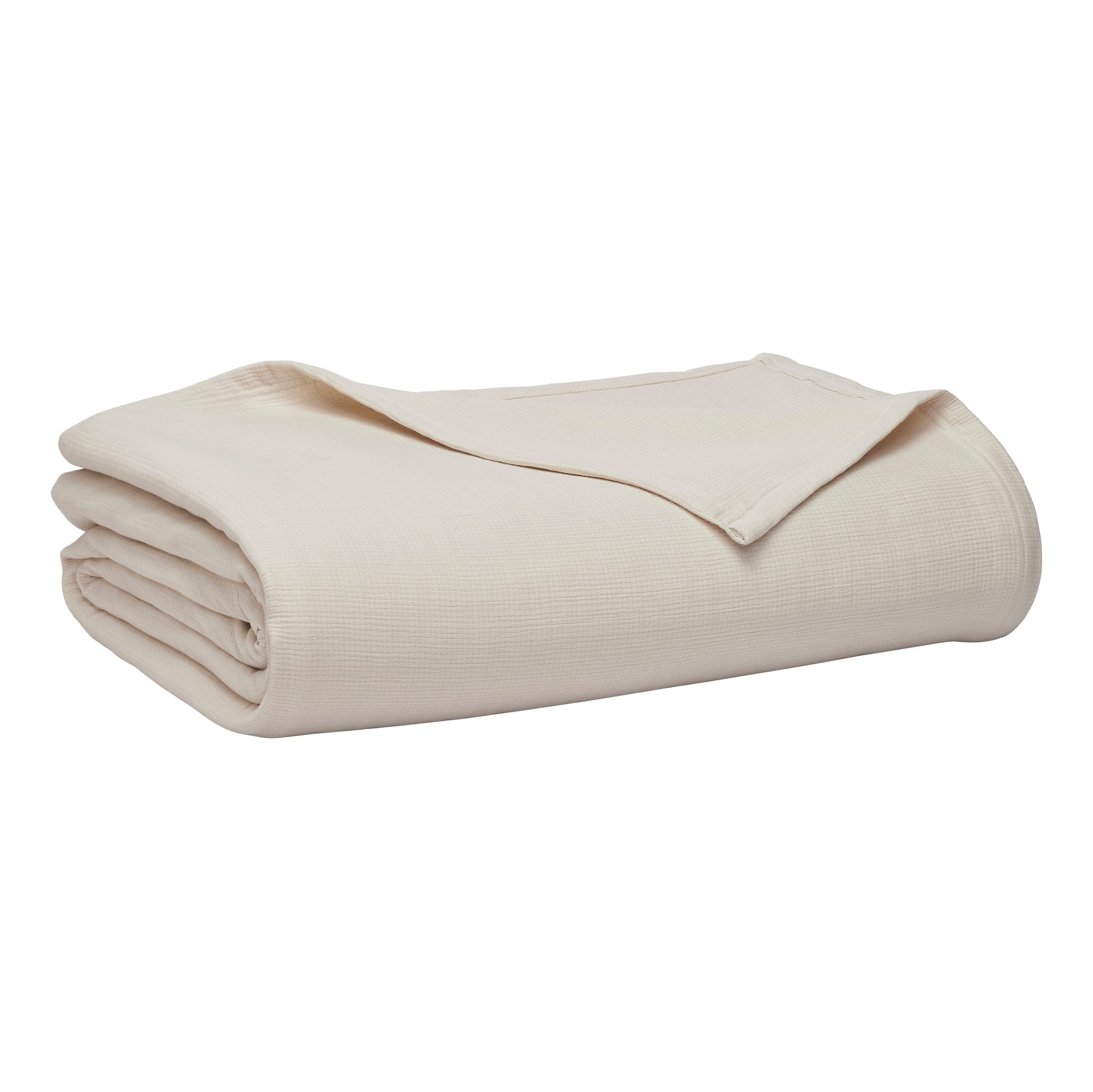 BL-860-9496_8|Stacked light beige waffle weave blanket, neatly folded for storage or display, showcasing its clean texture and versatility.