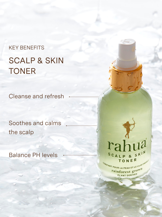 glass spray bottle with gold collar and green text rahua scalp and skin toner partially submerged in water, key benefits listed include cleanse and refresh, soothe and calm scalp and balance ph levels|variant:1-oz