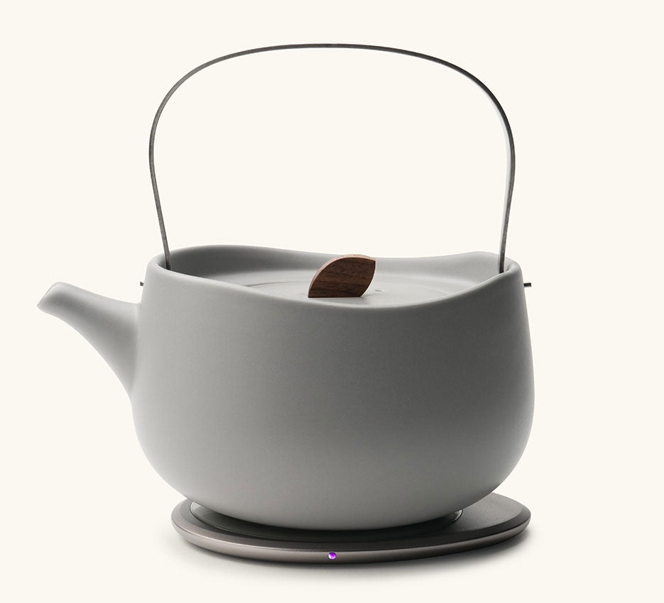 Leiph Self-Heating Ceramic Teapot Set 20 fl oz / 600 mL in Soft Gray on Ohom Charging Pad 3