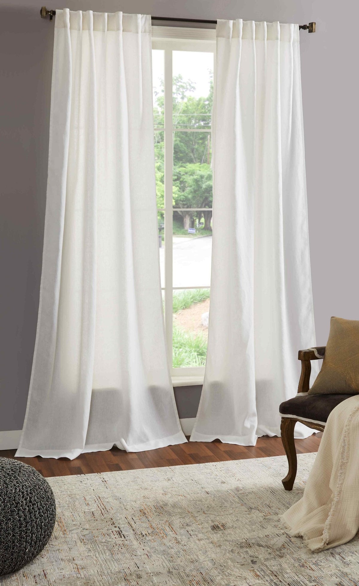 DY-712-X_1|Flowing white linen curtains in a bright room, offering privacy and natural light. Elegant window treatment.
