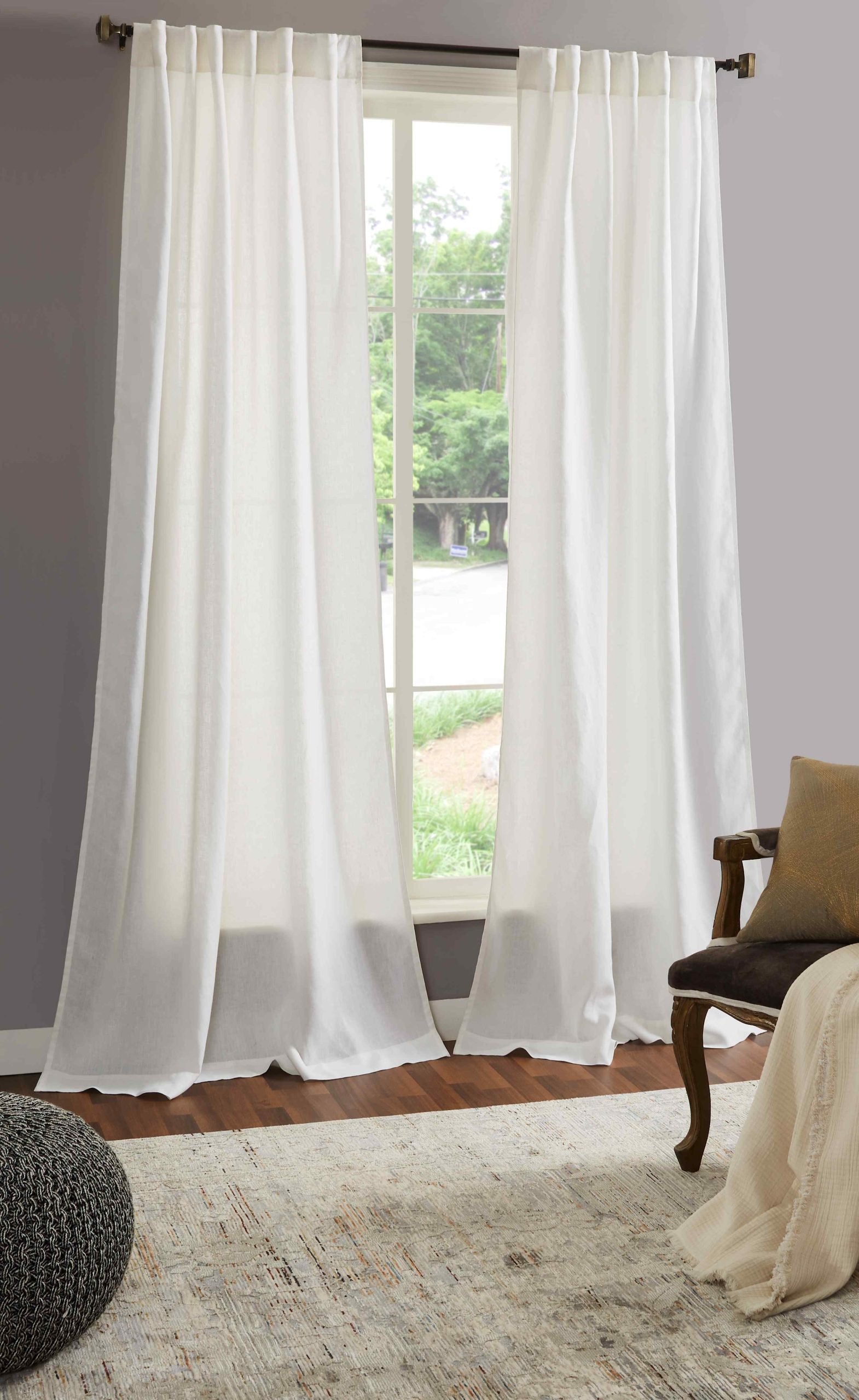 DY-712-X_1|Flowing white linen curtains in a bright room, offering privacy and natural light. Elegant window treatment.