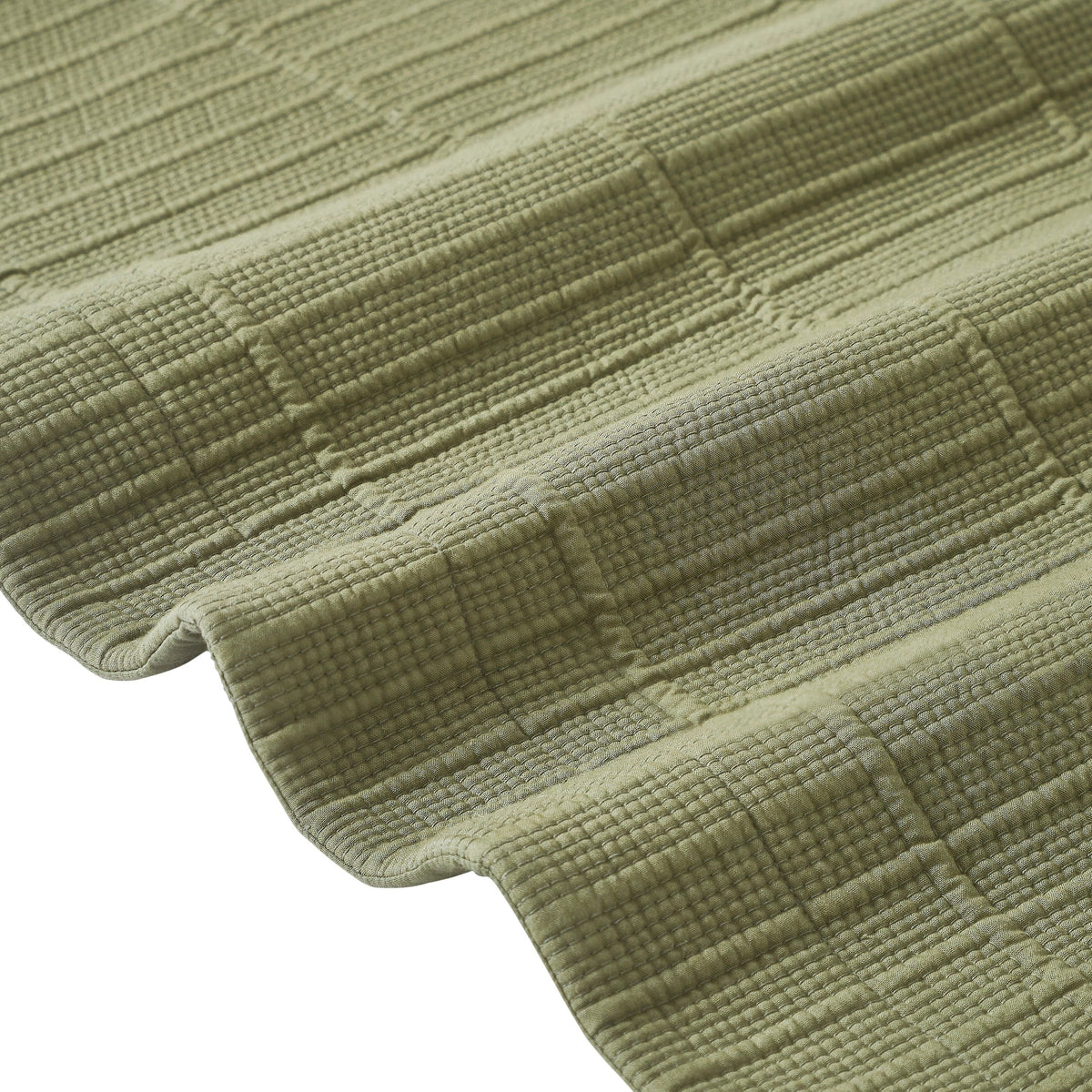 CL-270-9496_12|Close-up of sage green textured cotton blend coverlet, showcasing soft fabric and intricate woven stripe pattern.