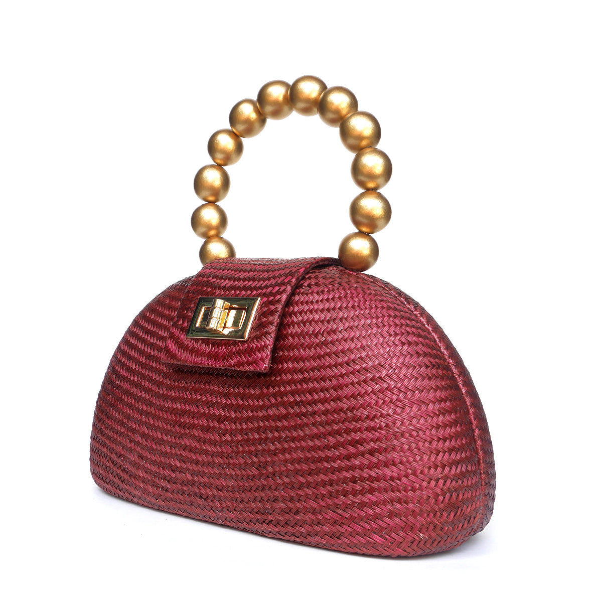 Side view of the Orla maroon buntal straw evening bag