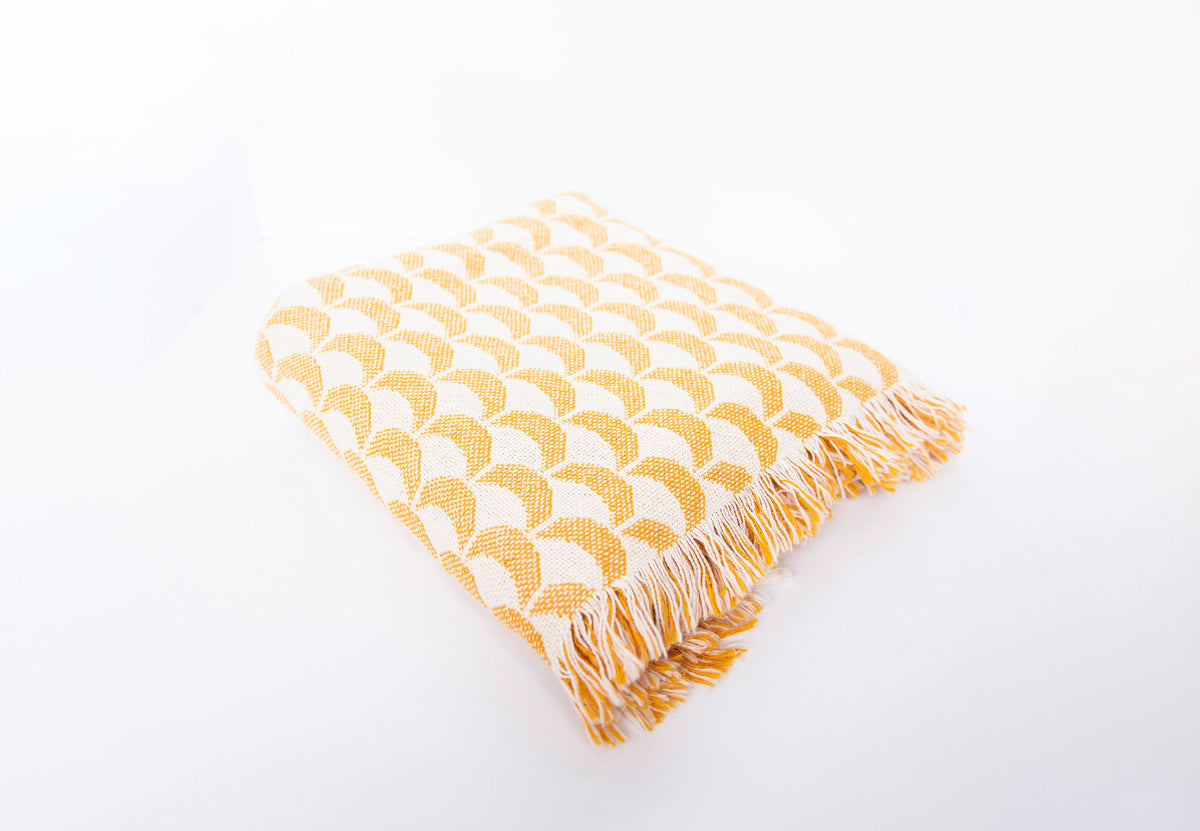 Folded Sadie golden yellow scallop reversible jacquard woven throw blanket