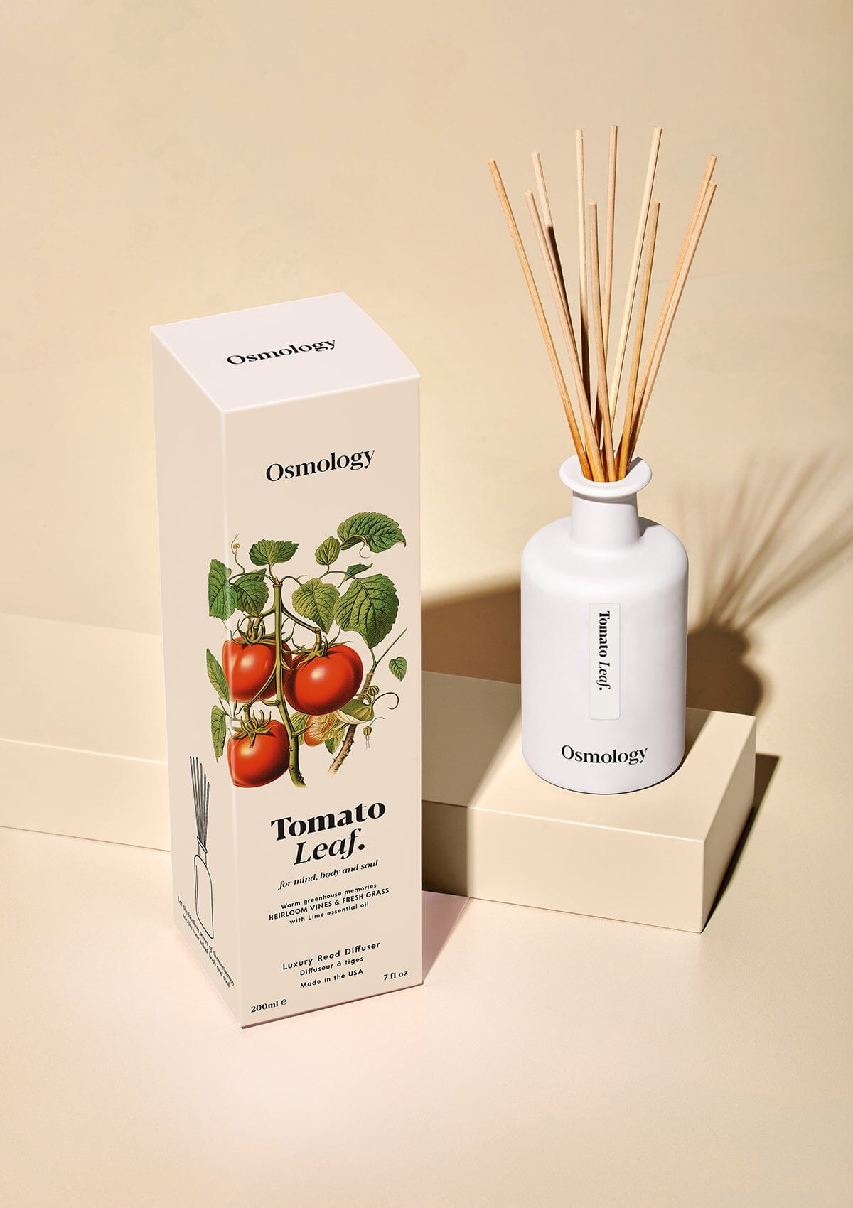 Tomato Leaf reed diffuser displayed next to product packaging on white background 
