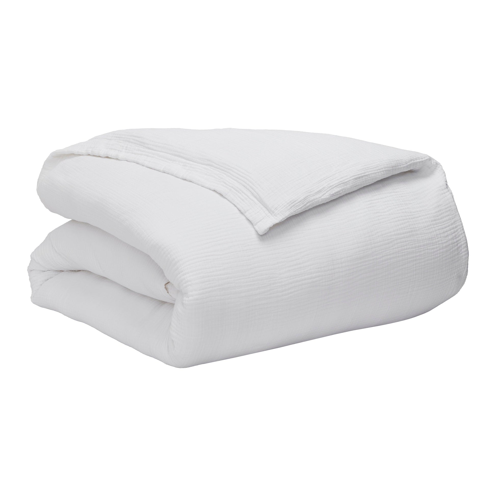 DT-048-9092_10|Neatly folded white crinkled muslin cotton duvet cover, showcasing its soft texture and elegant design.