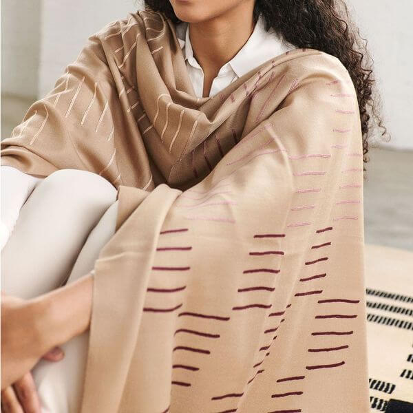 Maple Beige Handwoven Hand Embroidered Classic Scarf draped elegantly on a model, showcasing artisan embroidery.