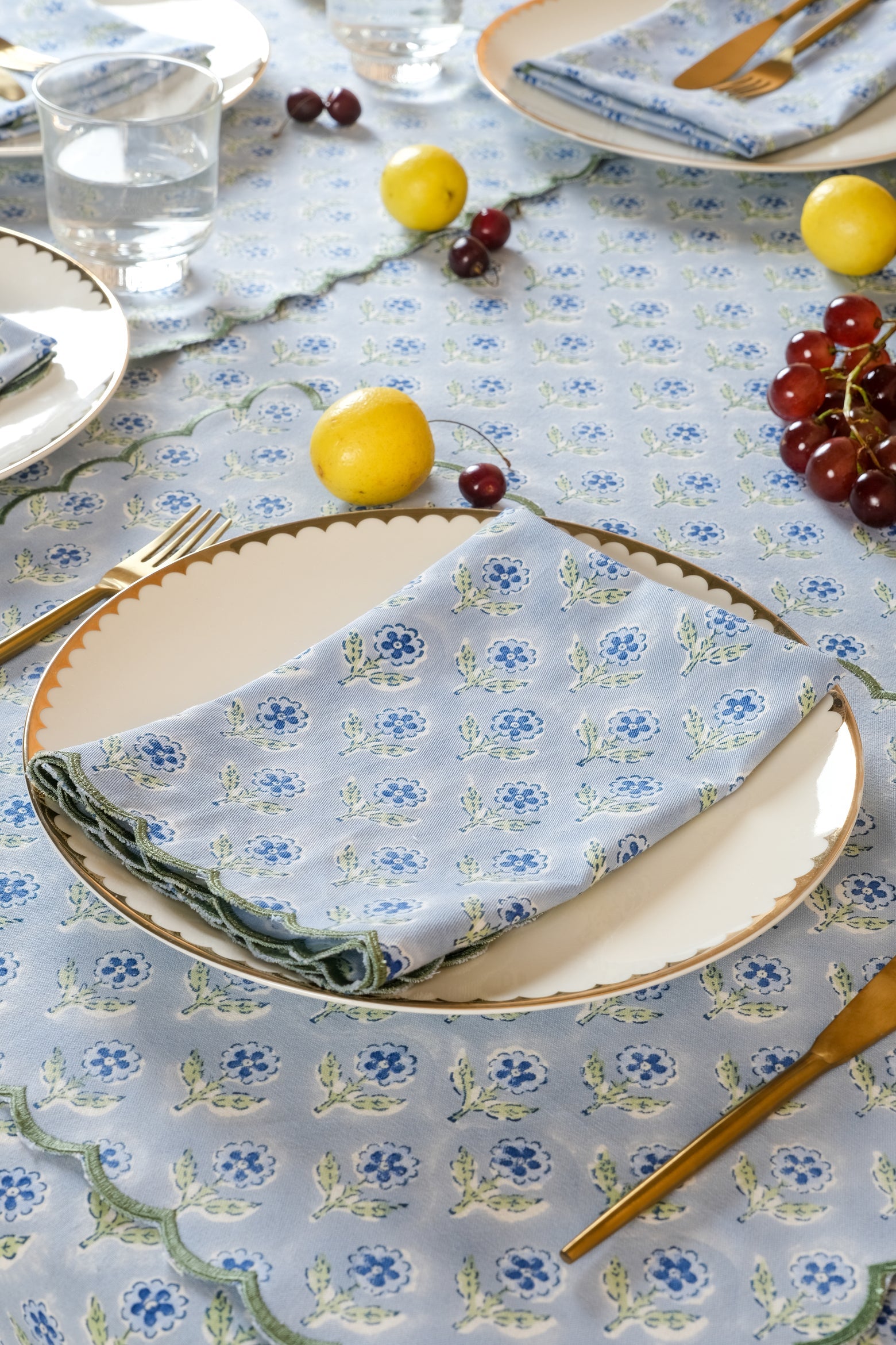 Inner Child blue scallop embroidered napkins set of 4 on dining table