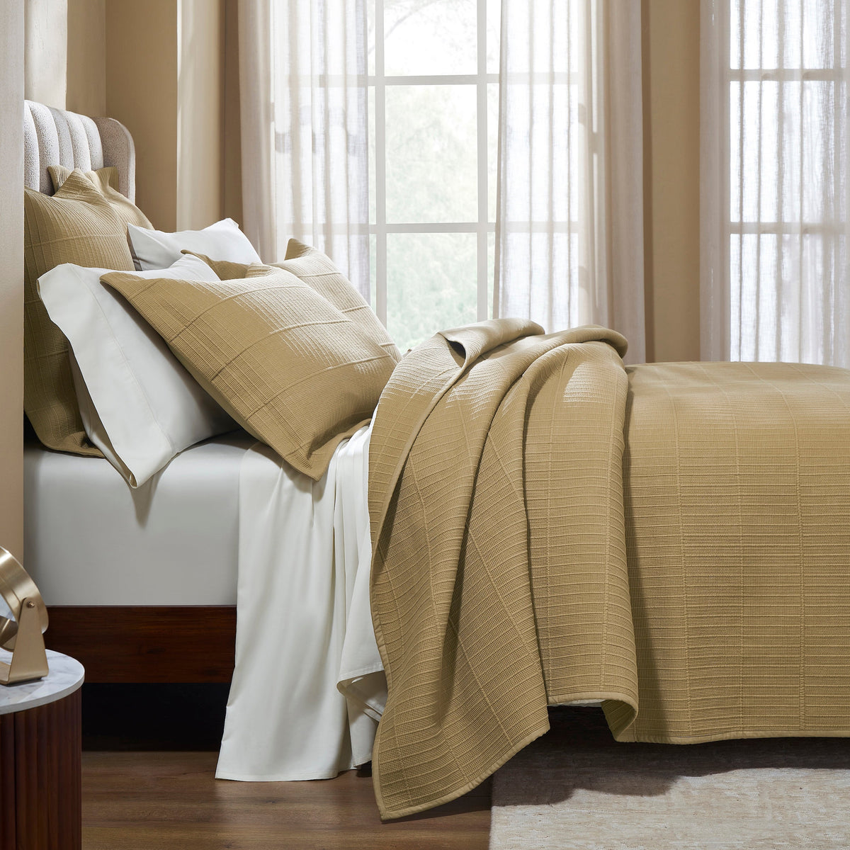 CL-269-11096_3|Gold beige textured quilted coverlet elegantly draped on a comfortable bed, creating a cozy and inviting bedroom.