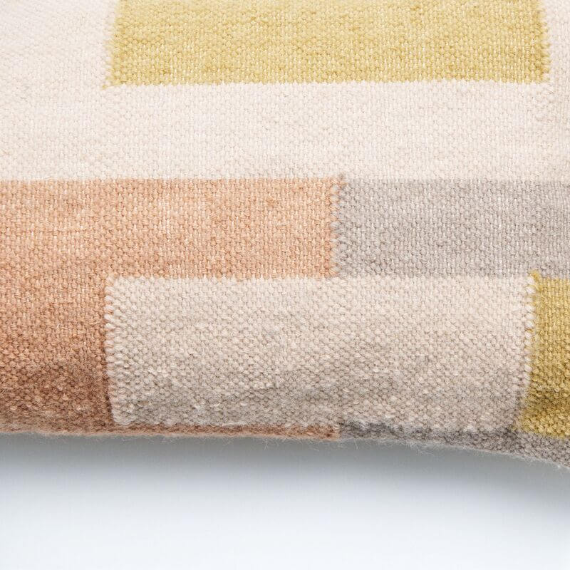 Shale Hand Woven Pastel Color Large Geometric Lumbar Pillow close-up showing soft cotton textures and pastel colors.