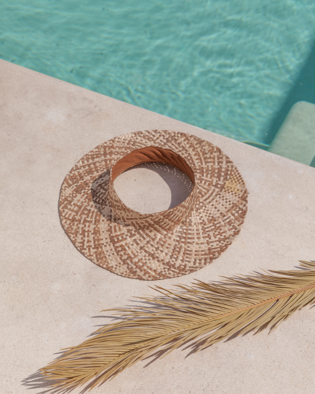 Ombre Holiday Papale Sun Hat handmade by Village Thrive using natural materials.