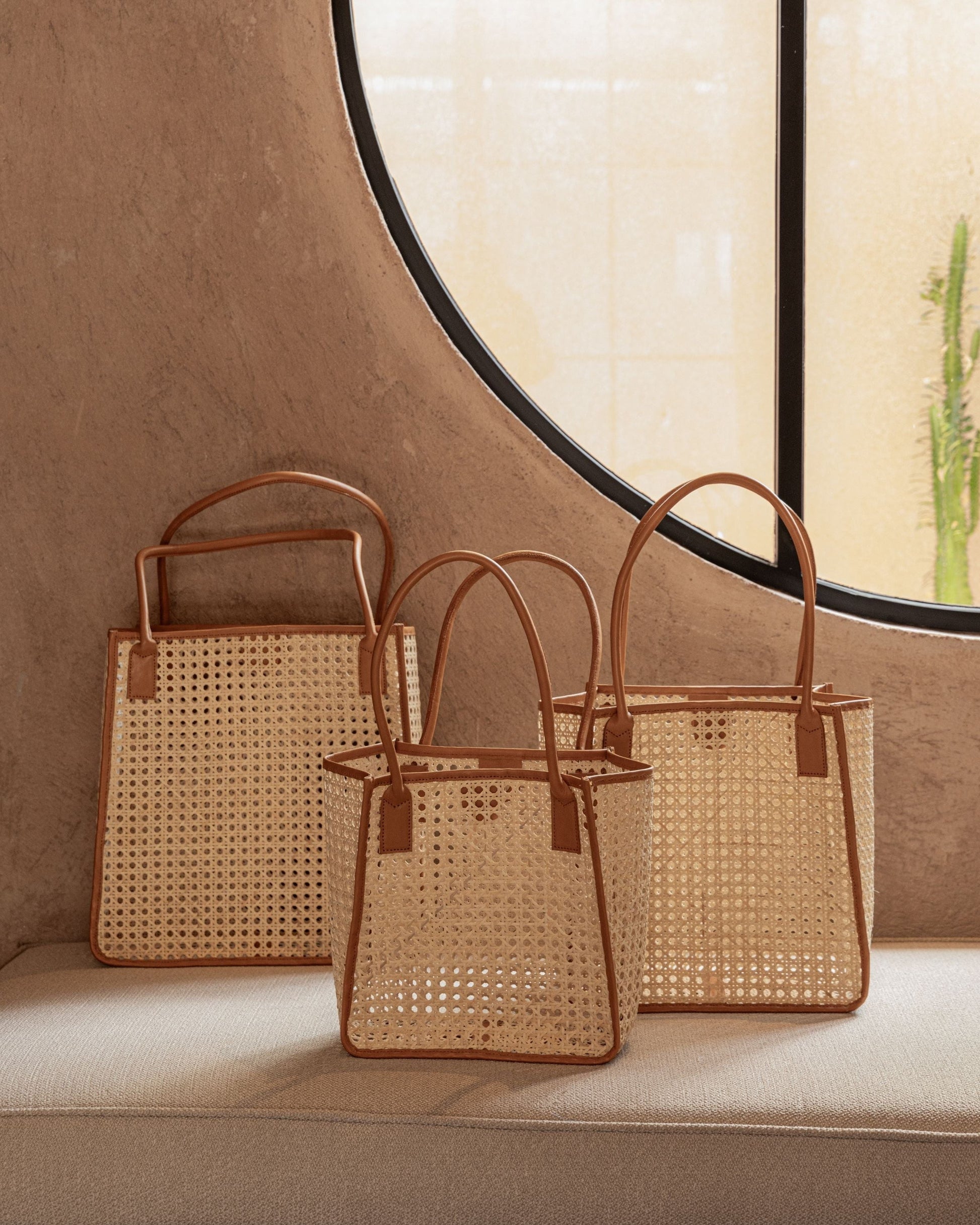 Citra Leather and Rattan Tote Bag handmade by Village Thrive using natural materials.
