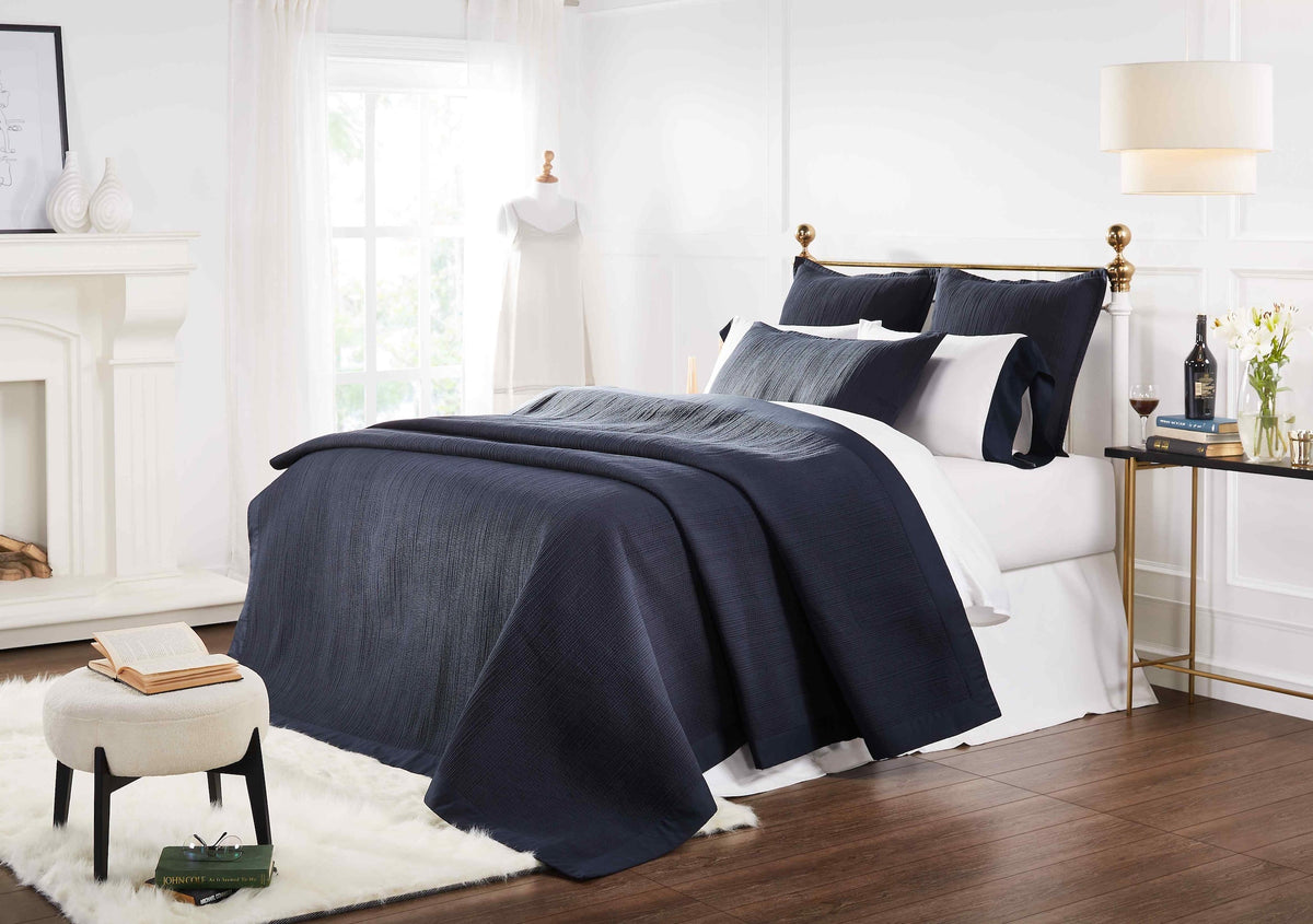 CL-167-9496_2|Navy blue textured coverlet set on a bed, elegant and cozy bedroom solution for comfortable, stylish sleep.