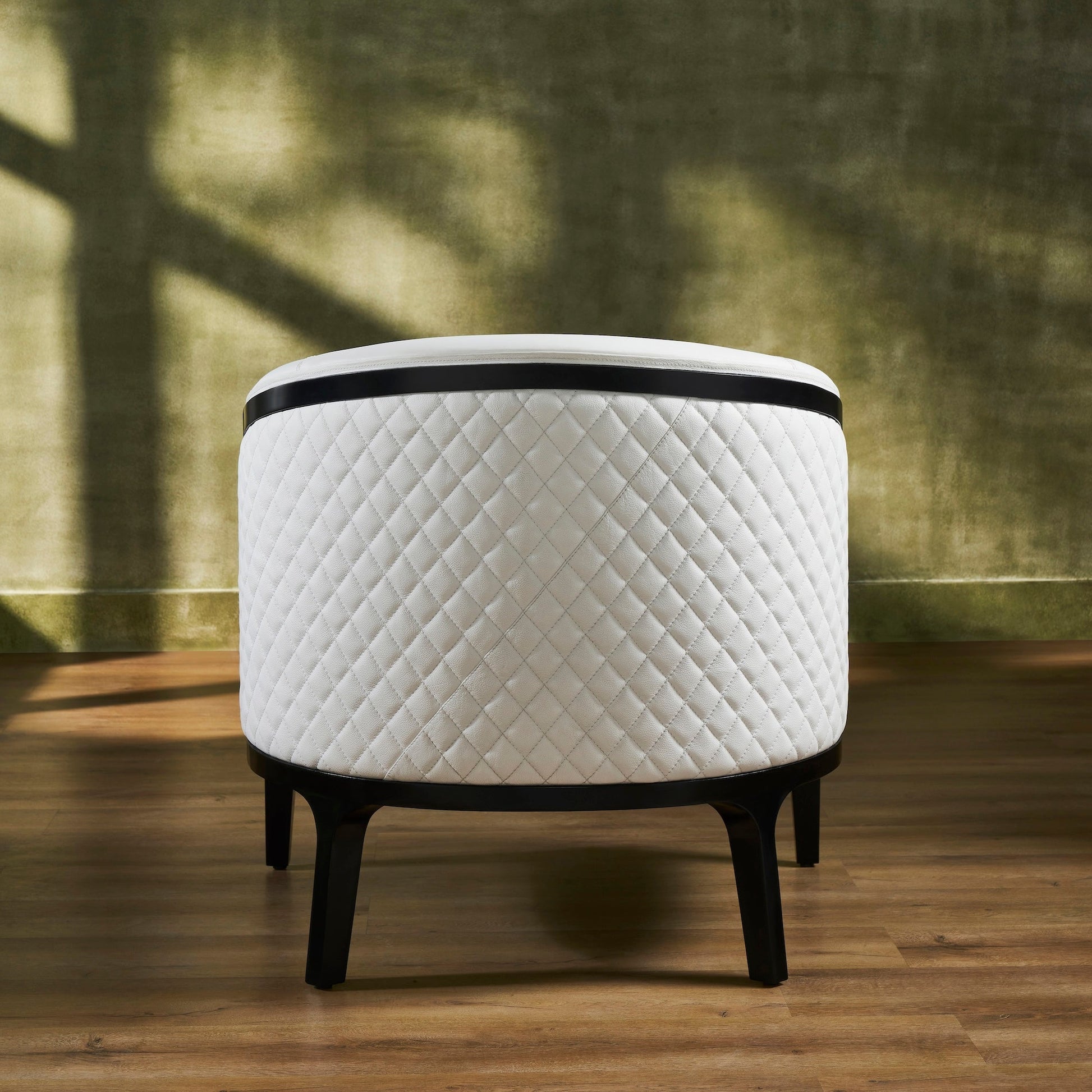 FN-5204-343329_5|Round white leather ottoman with quilted exterior and dark wood base, a versatile piece of luxury leather furniture.