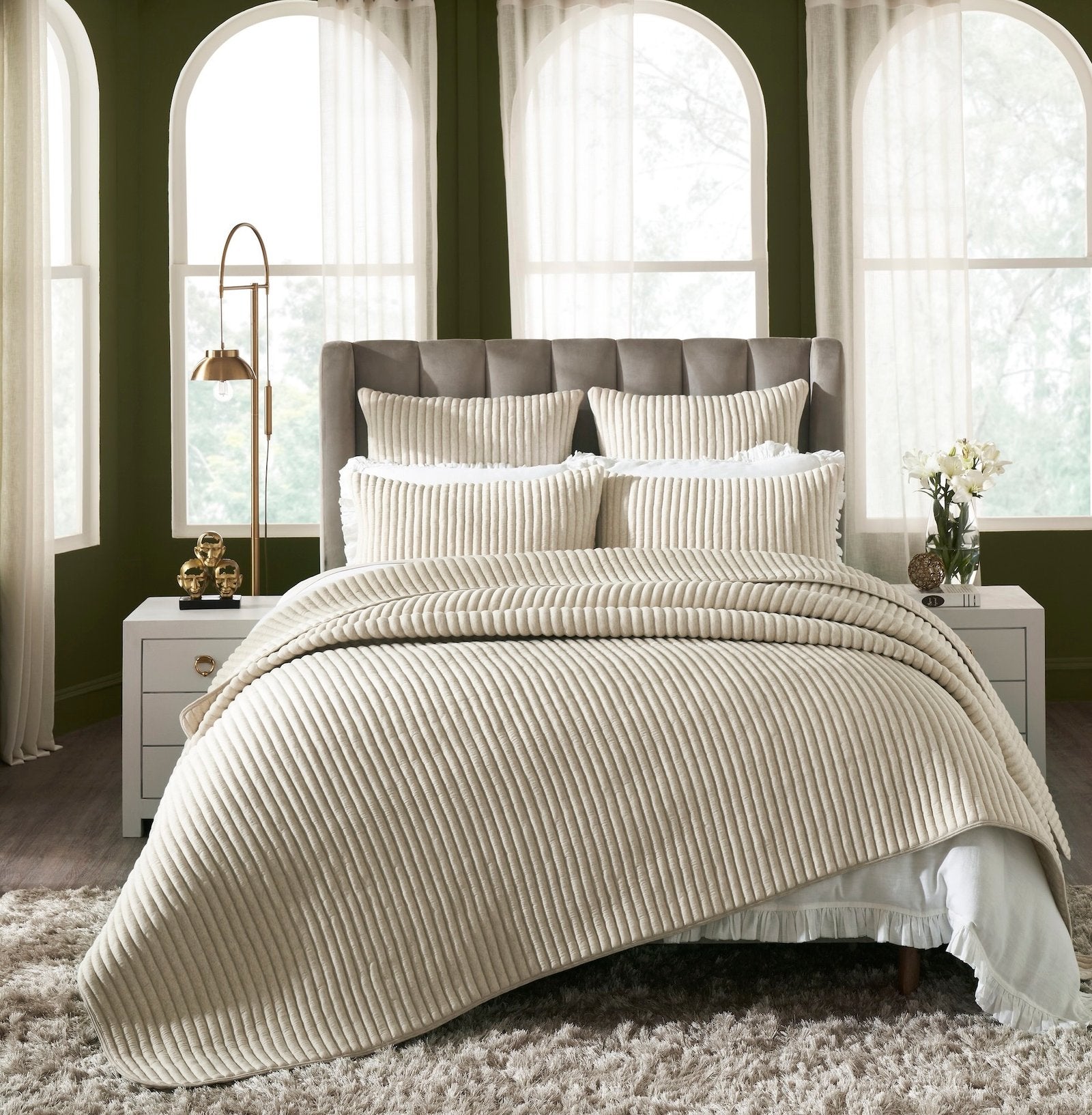 QT-368-11096_1|Elegant bedroom with beige ribbed quilted quilt, shams, and throw pillows, creating a cozy and inviting atmosphere.