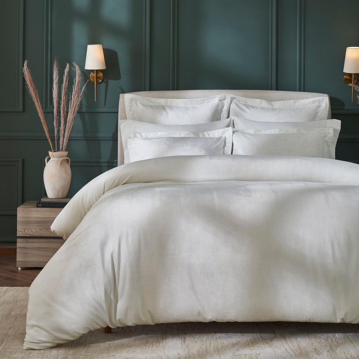 DT-052-9092_1|White textured duvet cover with subtle ribbed pattern, enhancing an elegant bedroom with dark green walls, inviting comfort.