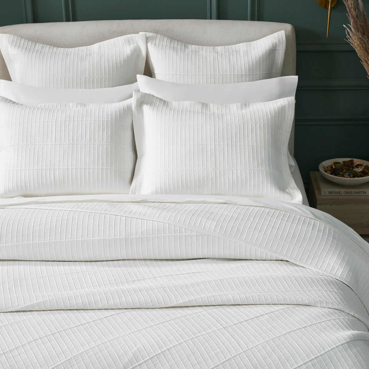 CL-268-11096_4|Close-up of elegant white textured coverlet, showcasing its modern striped pattern and soft, luxurious bedding material.