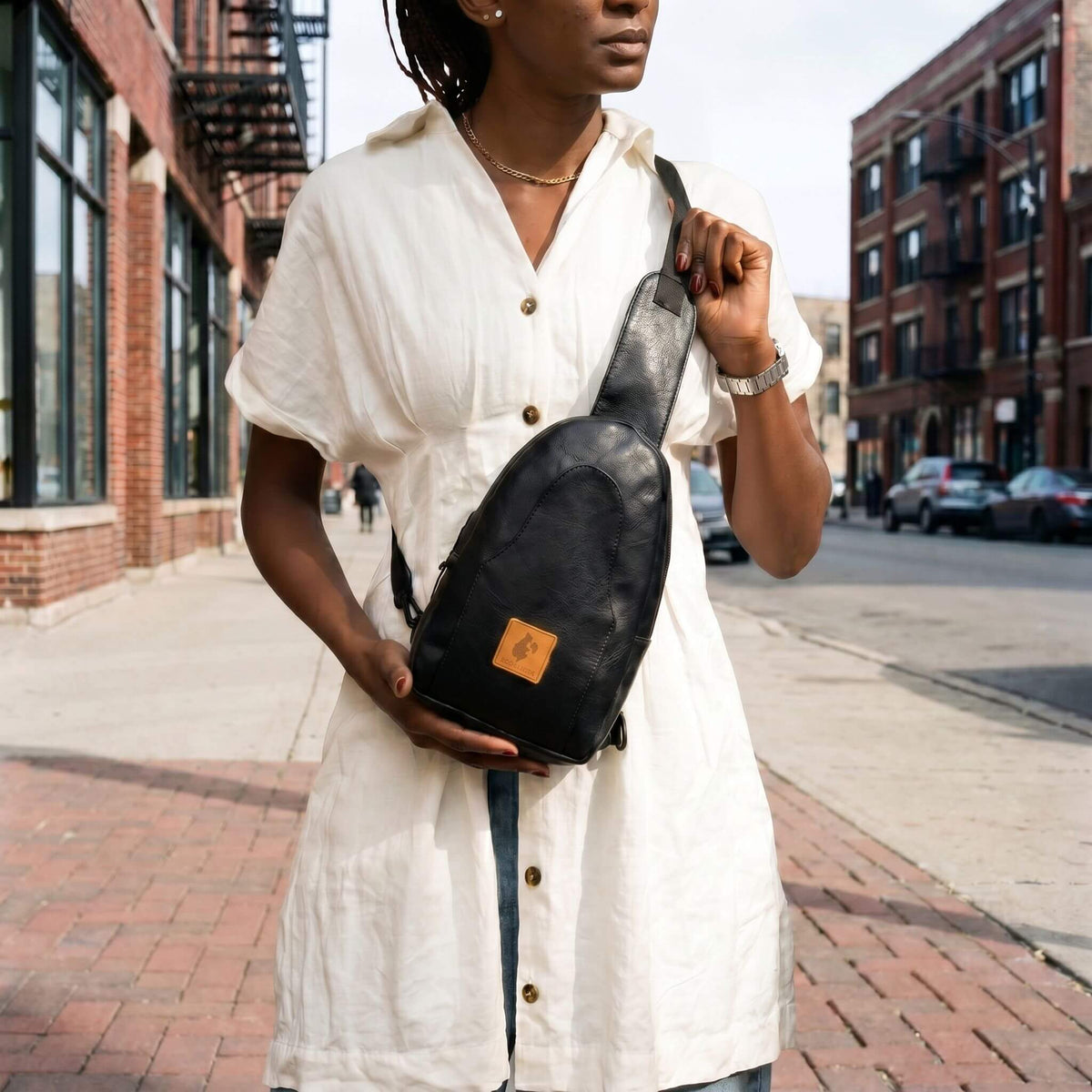 Buru black vegan leather crossbody sling bag #color_black