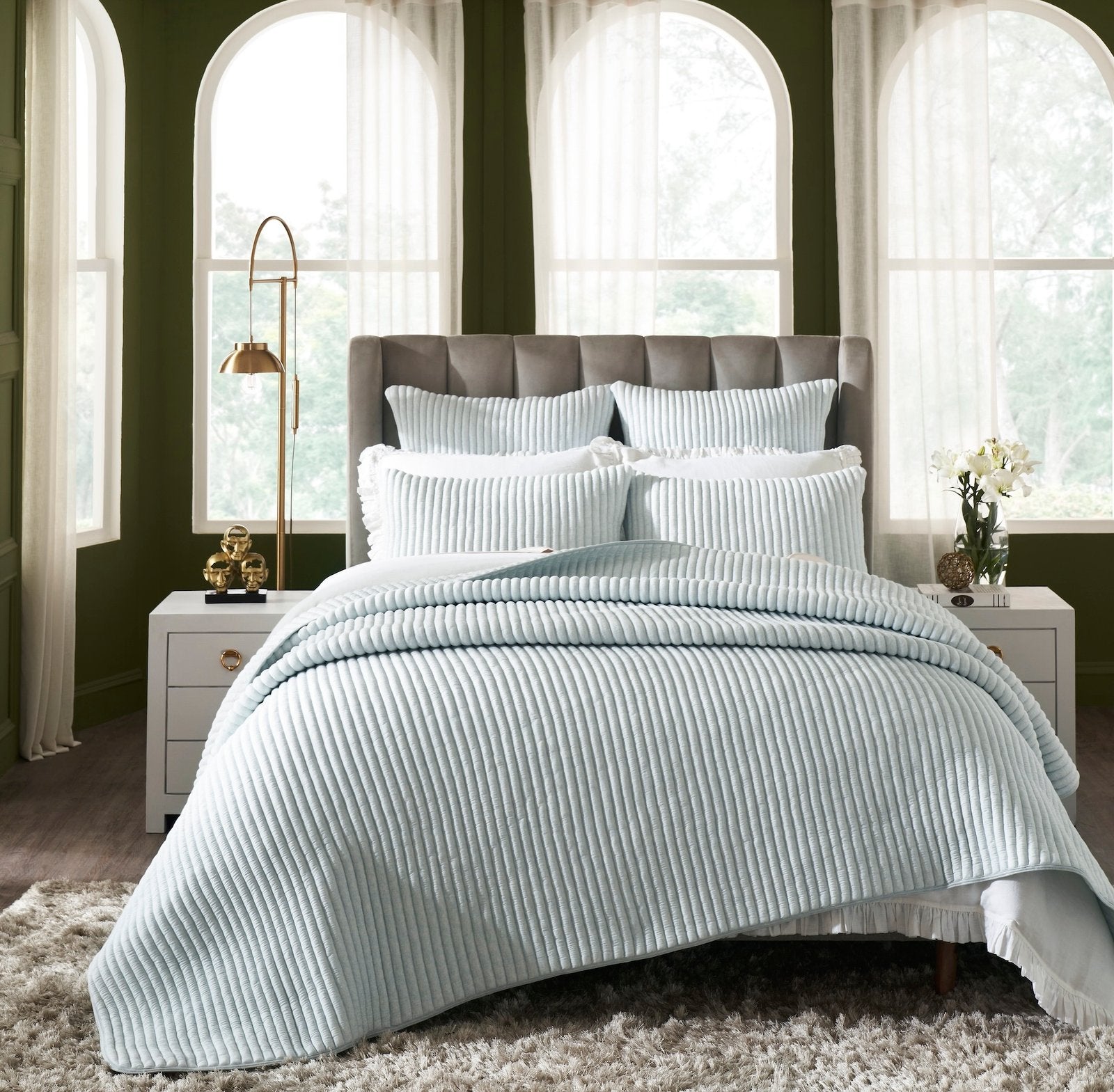 QT-369-9496_1|Modern light blue ribbed quilted bedspread, offering unique texture and tranquil comfort for a contemporary bedroom space.