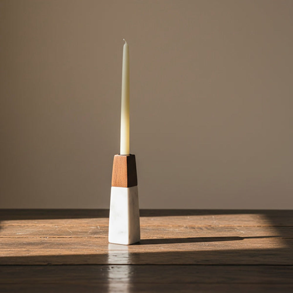 white marble candleholder styled on table with candle
