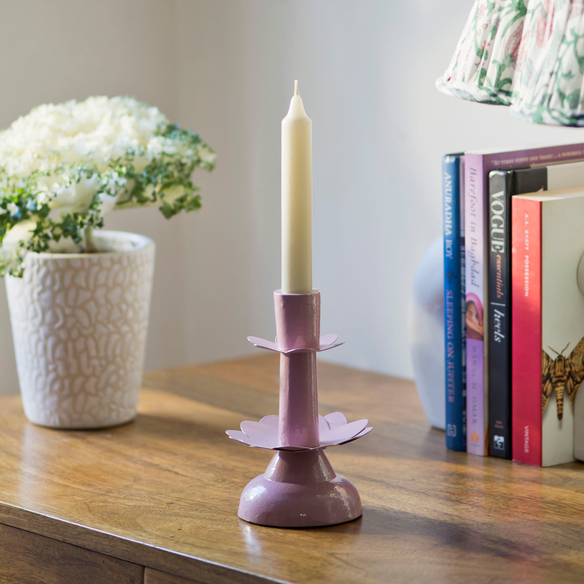 Artisanal pink bloom candlestick, adding a touch of floral fluidity and modern calm to any room.