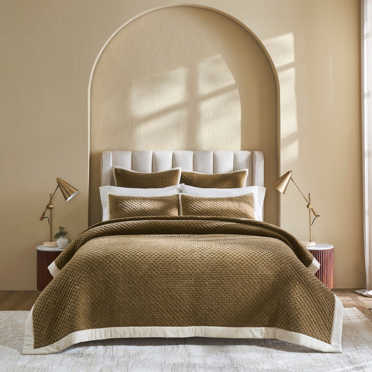 QT-378-11096_1|Luxurious golden-brown quilted bedspread with matching shams and pillows, featuring a textured design and cream trim.