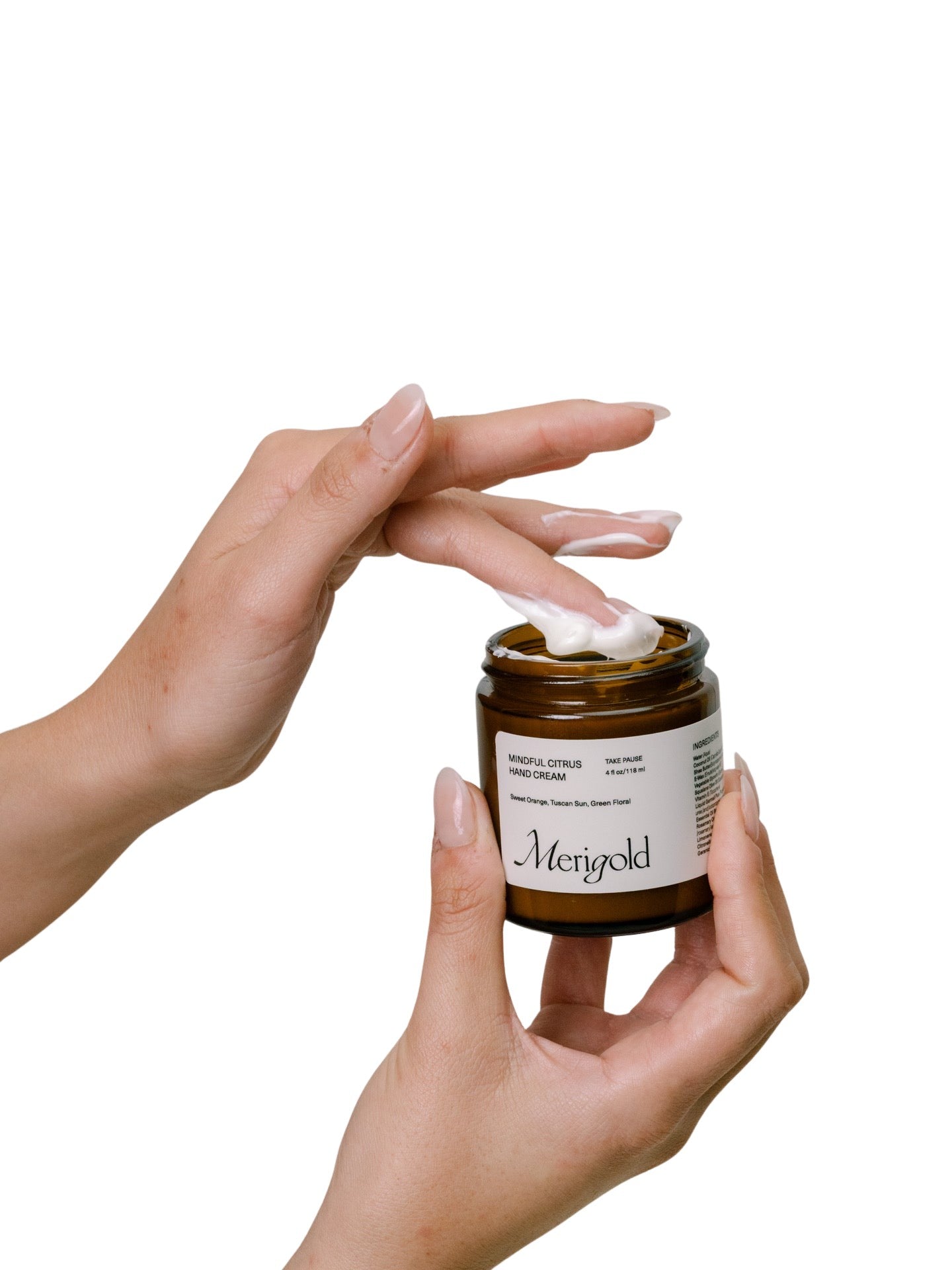 Merigold Mindful Citrus Hand Cream full size collection in amber packaging, bright citrus hydration.