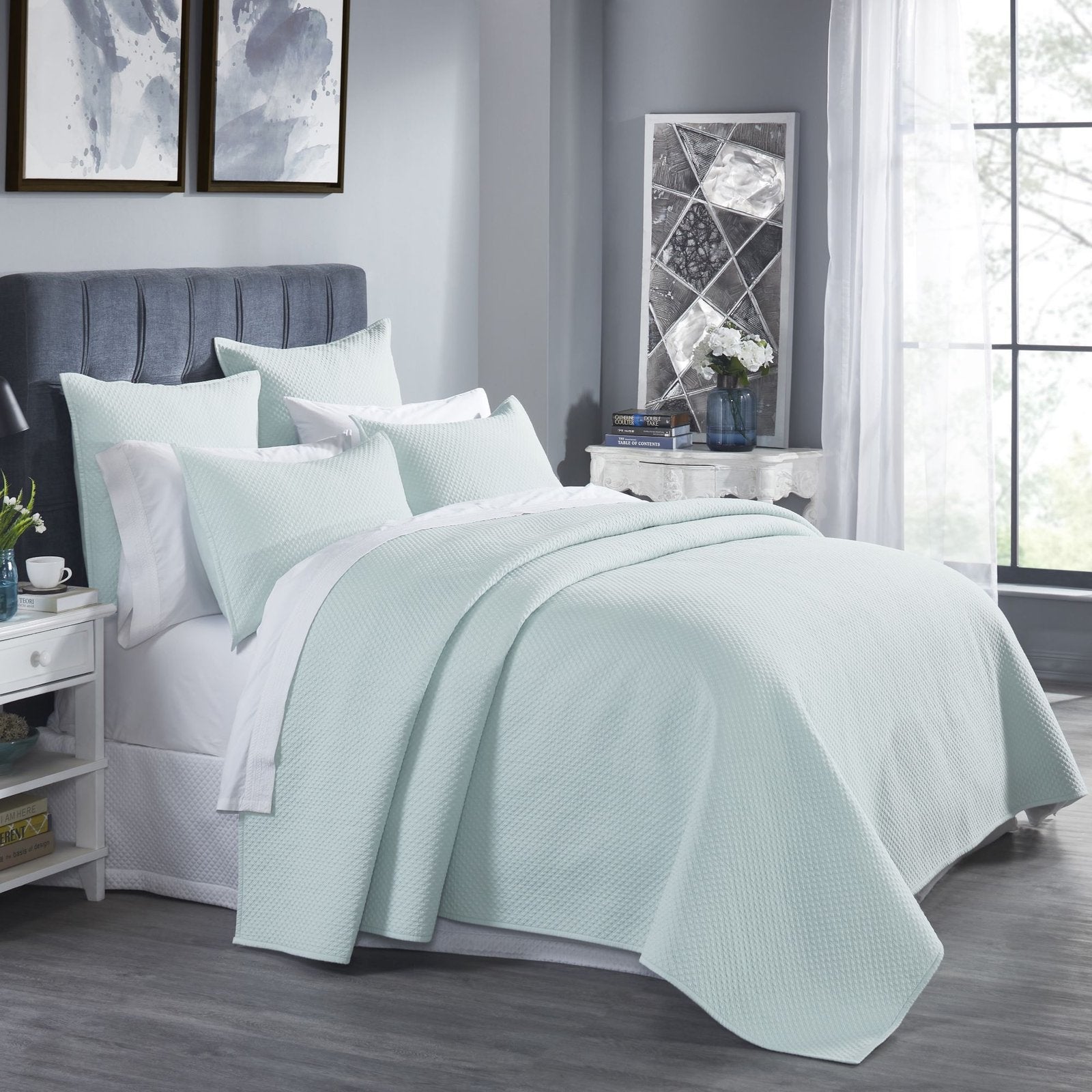 CL-252-11096_2|Refreshing mint green quilted coverlet adorning a stylish bed, offering cozy comfort and elegant modern bedroom appeal.