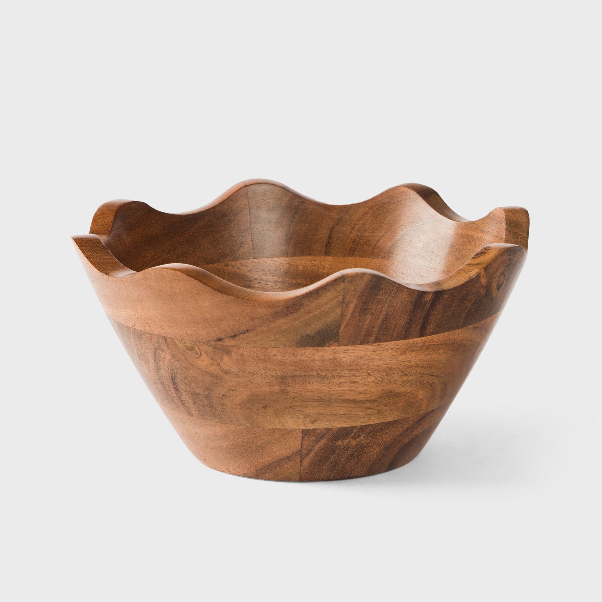 Acacia wood scalloped serving bowl with natural finish