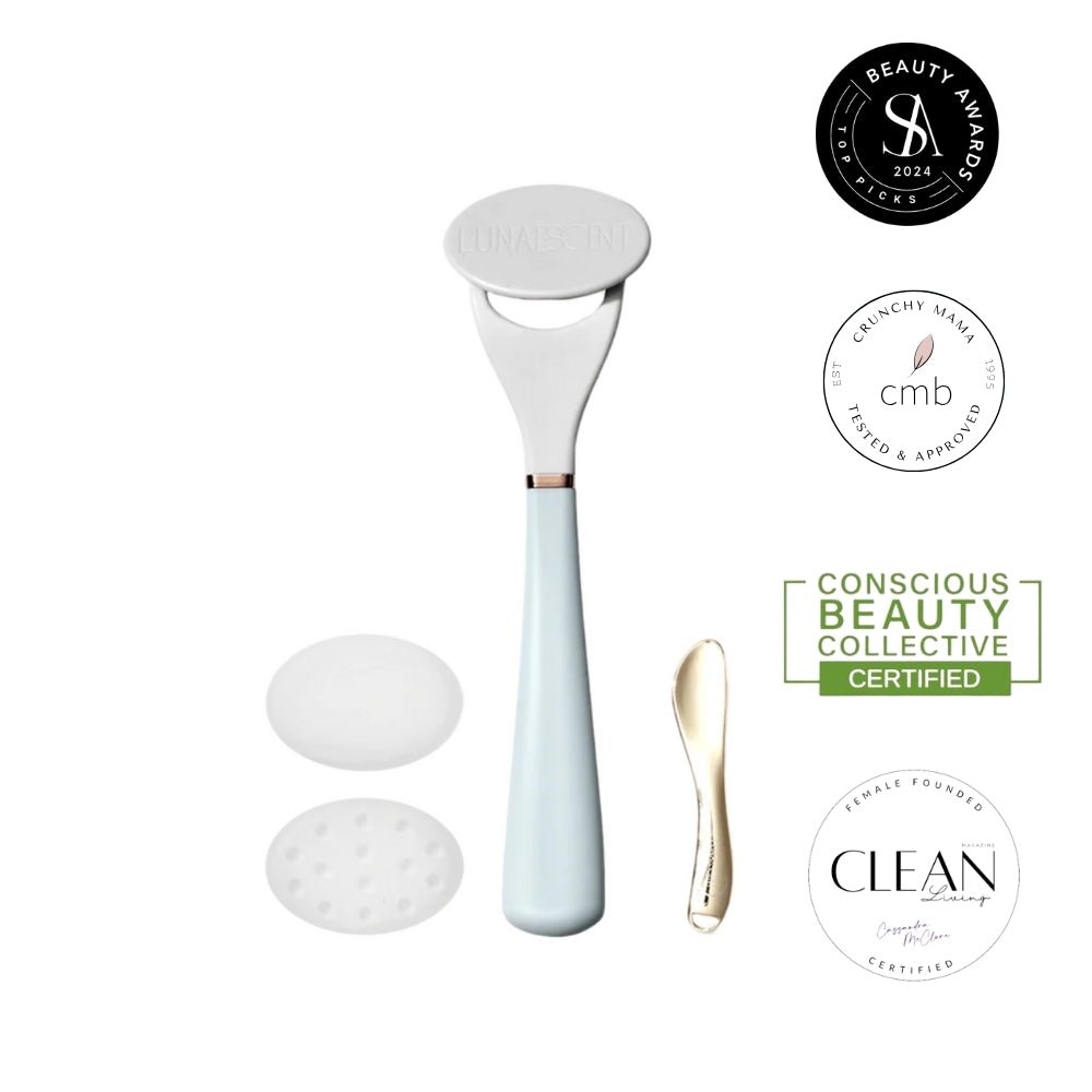 A white touch-free skincare applicator with a spatula, along with two silicone pads and certification badges.