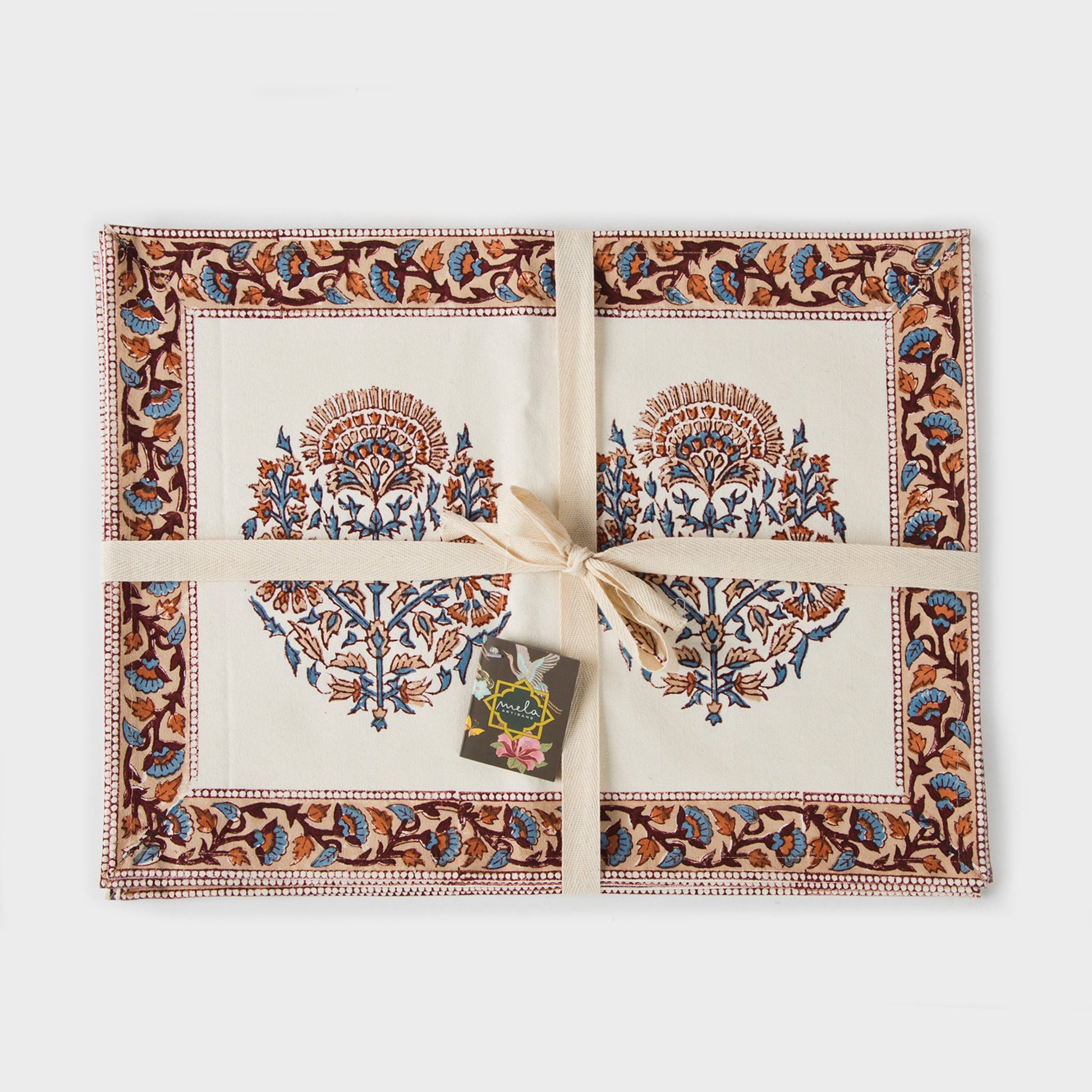 Handcrafted 100% cotton placemats featuring traditional Indian floral block printing.