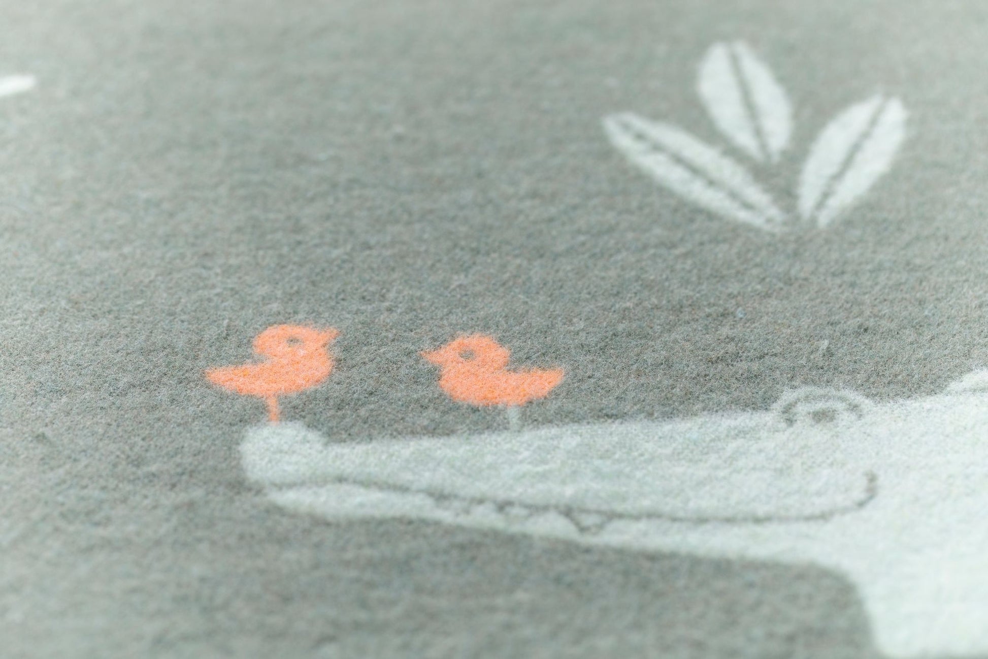 JUWEL baby blanket "crocodiles allover" in green . Blanket made by David Fussenegger , a family-run mill in Austria.
