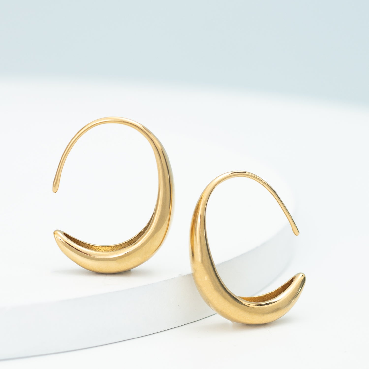 Side by side photo of golden hoop set, golds, online jewelry store, jewelry like pandora, fair trade women's jewelry