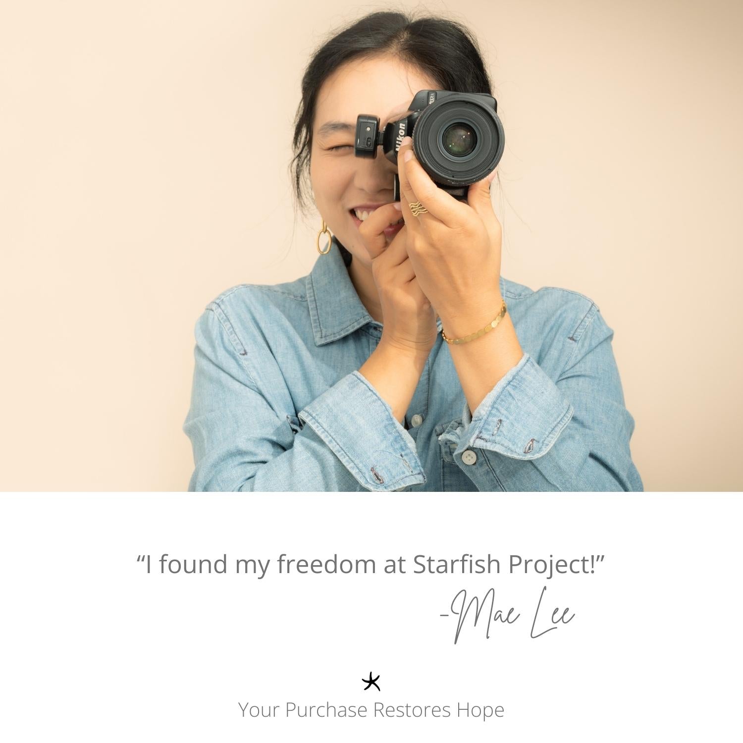 Photo of a woman holding a camera, Starfish Project, artisan jewelry, symbol of hope, freedom, high quality jewelry